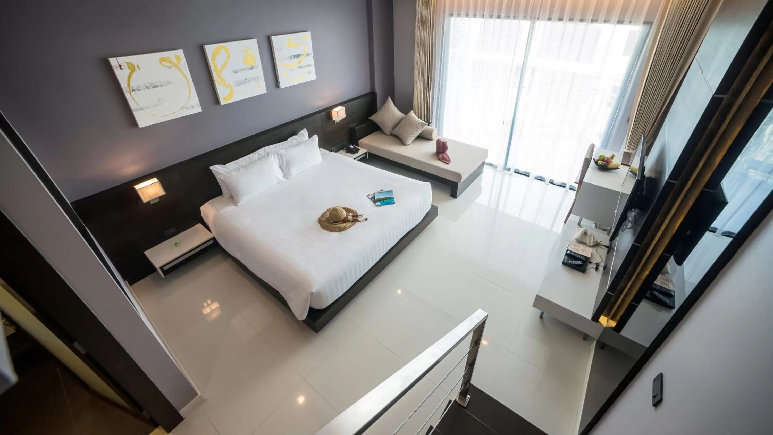 Bed in The Charm Resort Phuket - SHA Certified