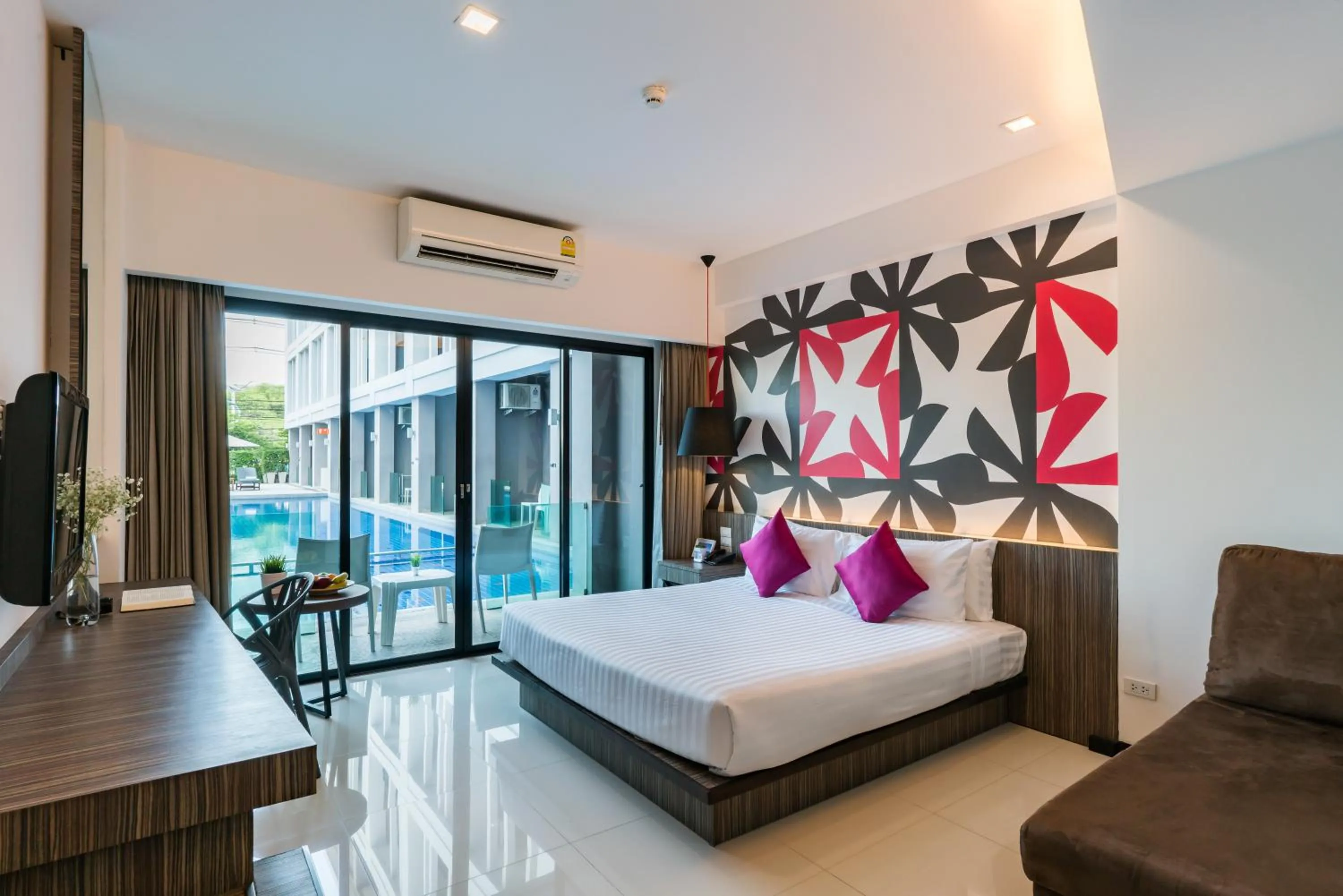 Bed in Hotel J Residence Pattaya