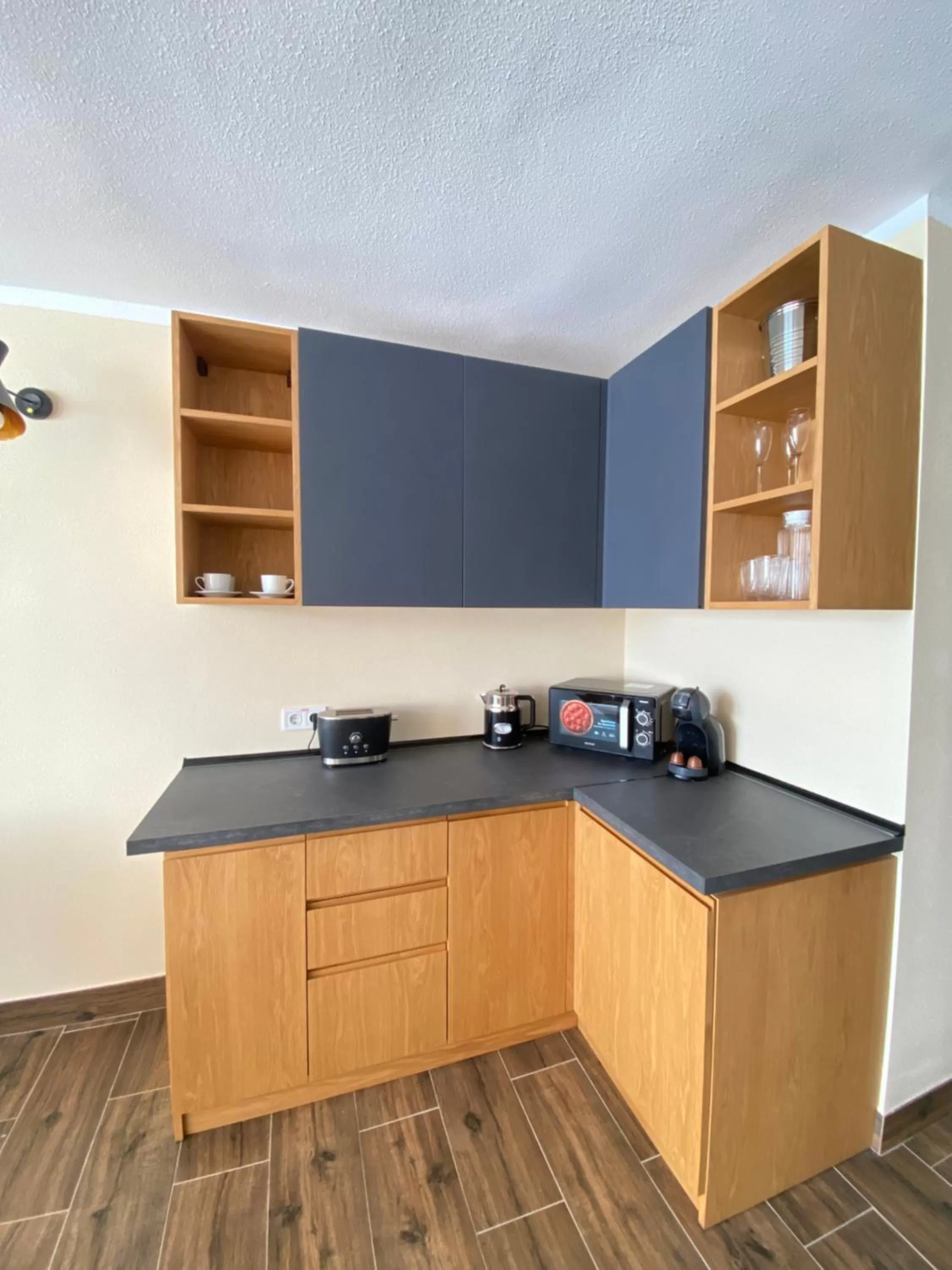 Kitchen or kitchenette in El Patio Hostal