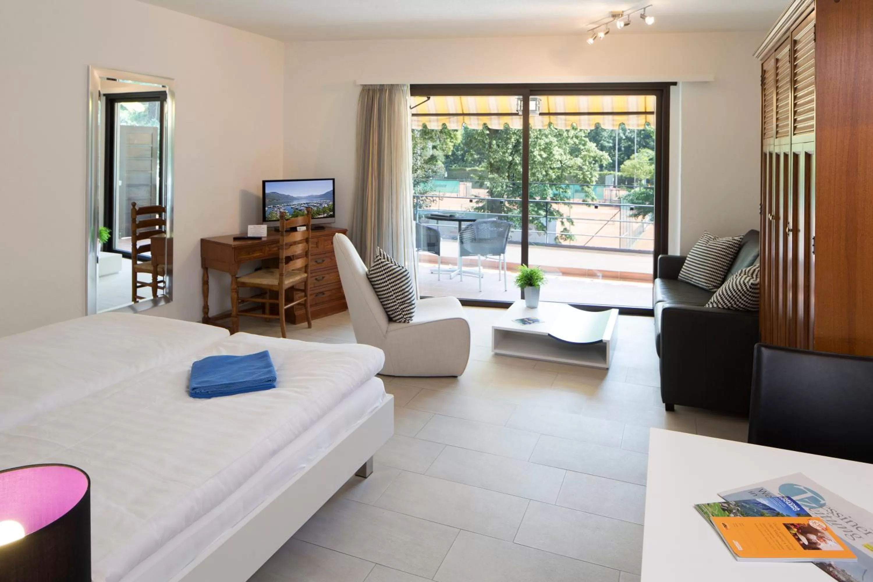 Photo of the whole room in Aparthotel Al Lago