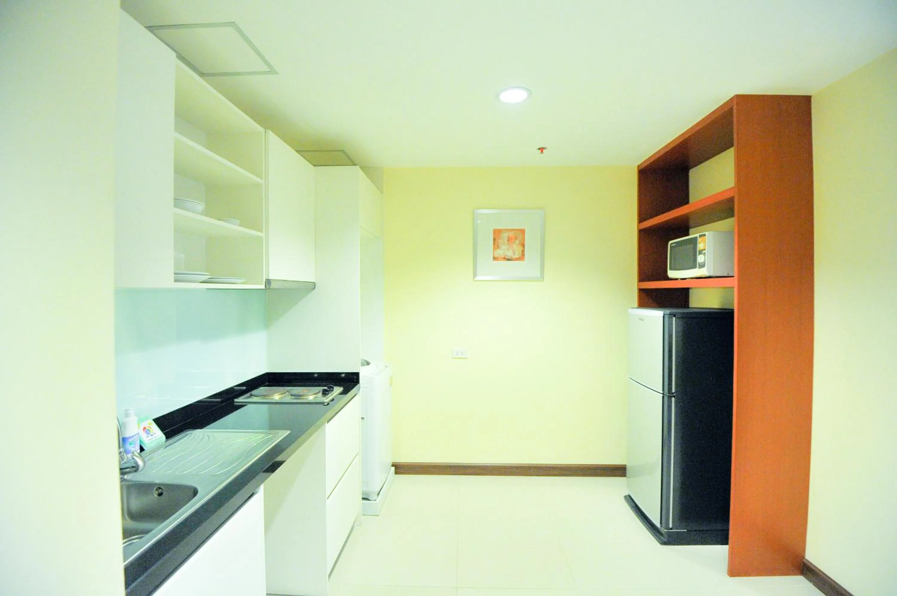 Kitchen or kitchenette in 42Grand Residence