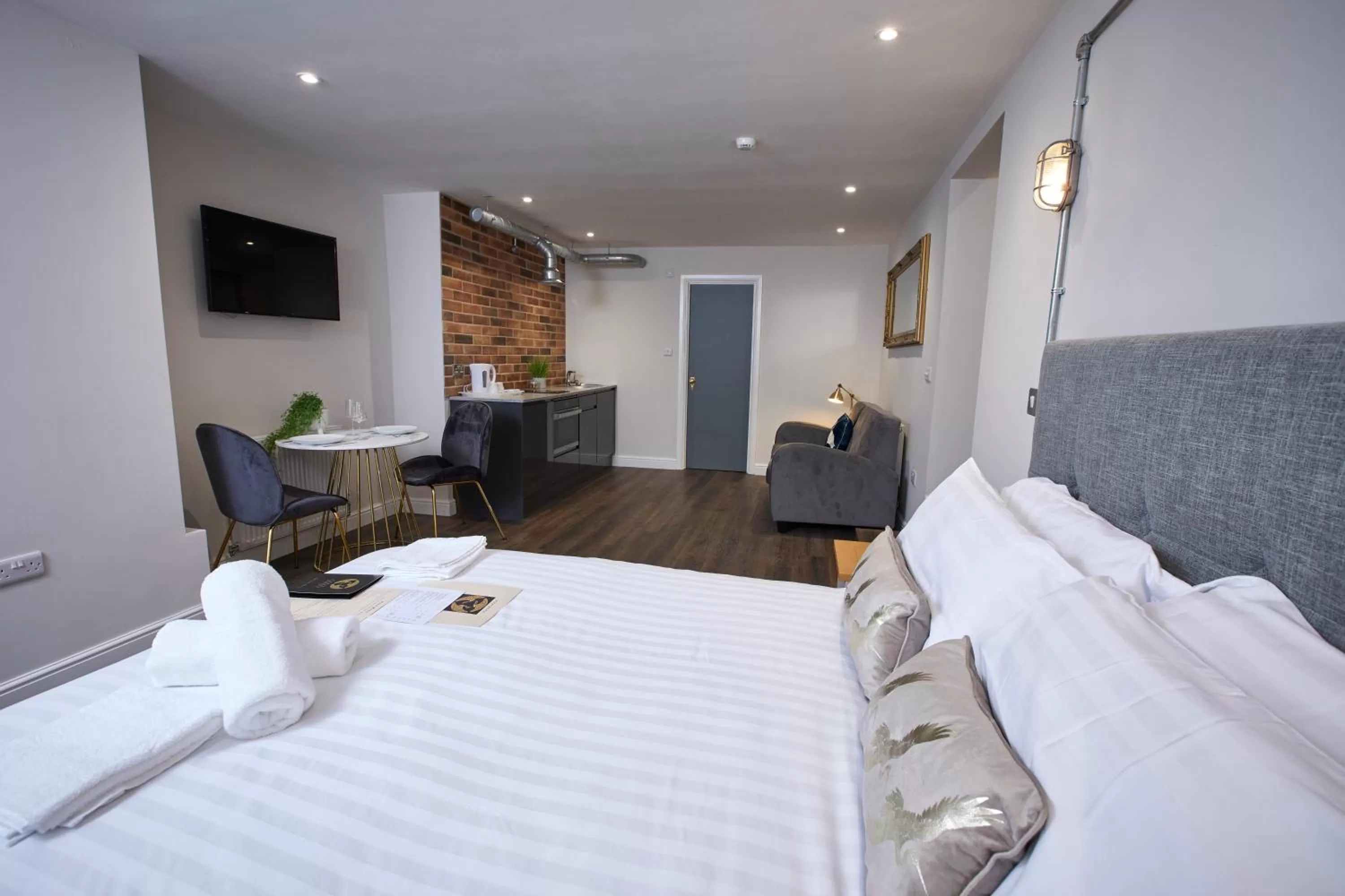 Bed in Three Cranes Serviced Apartments