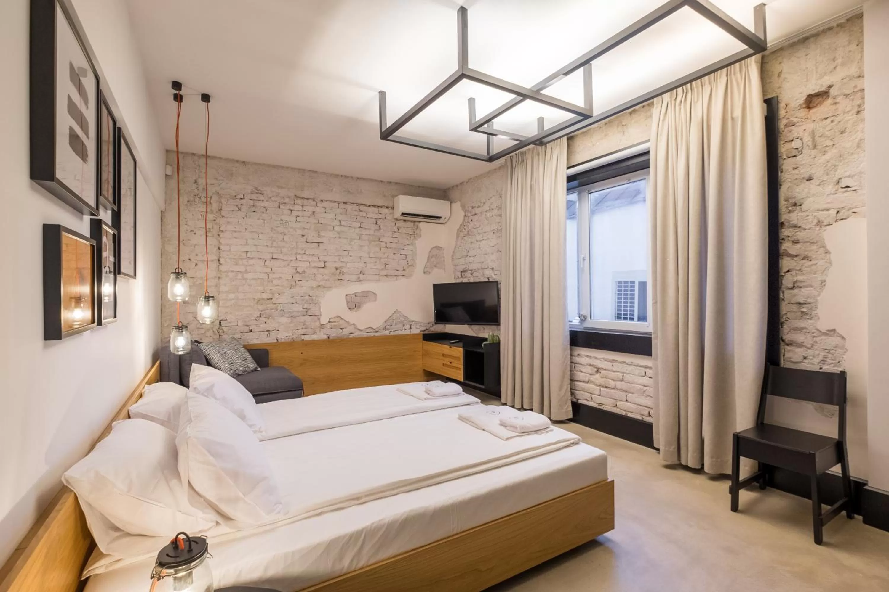 Bed in R34 Boutique Hotel