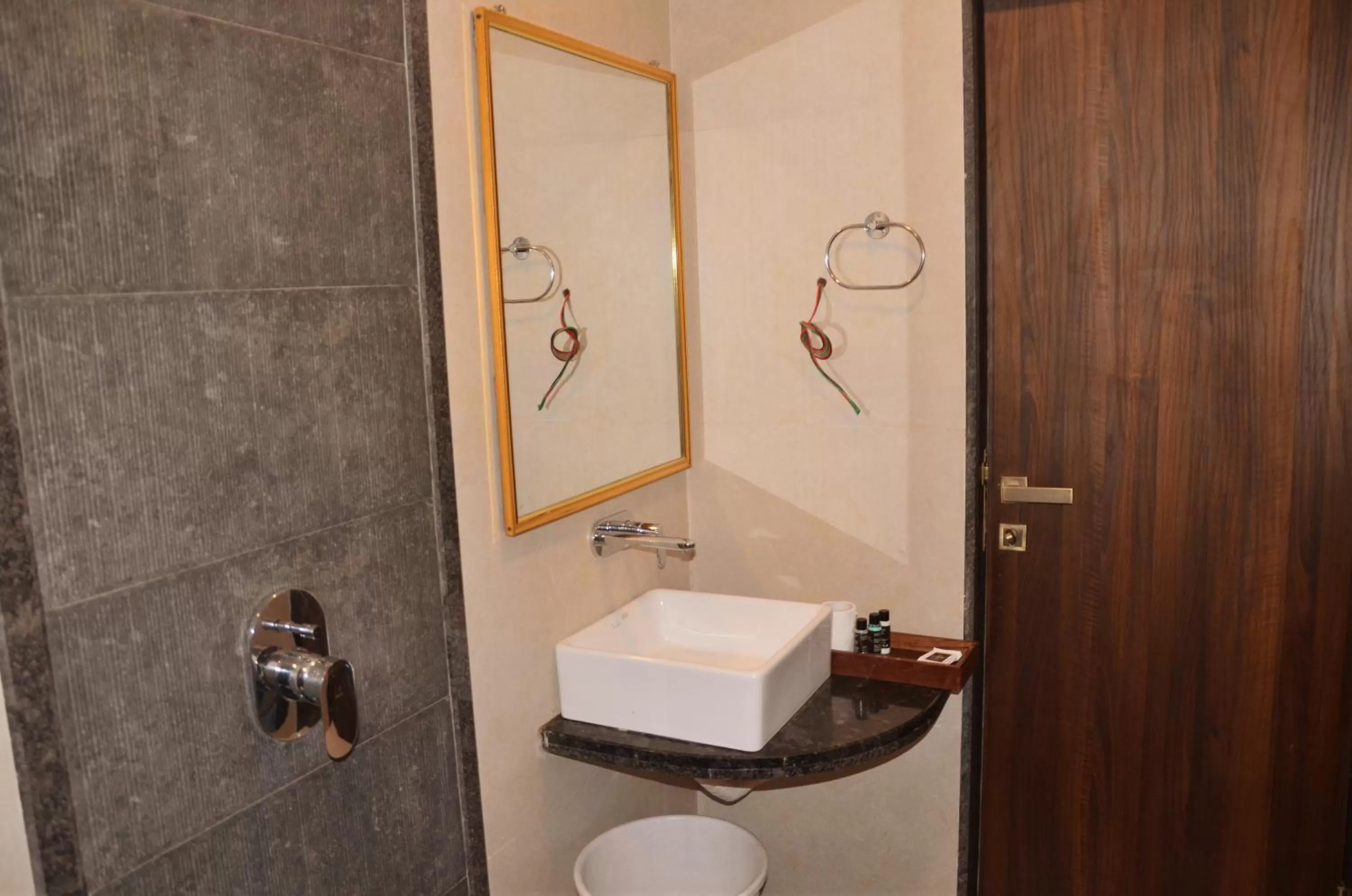 Shower in Mountain Breeze Resort, Mahabaleshwar