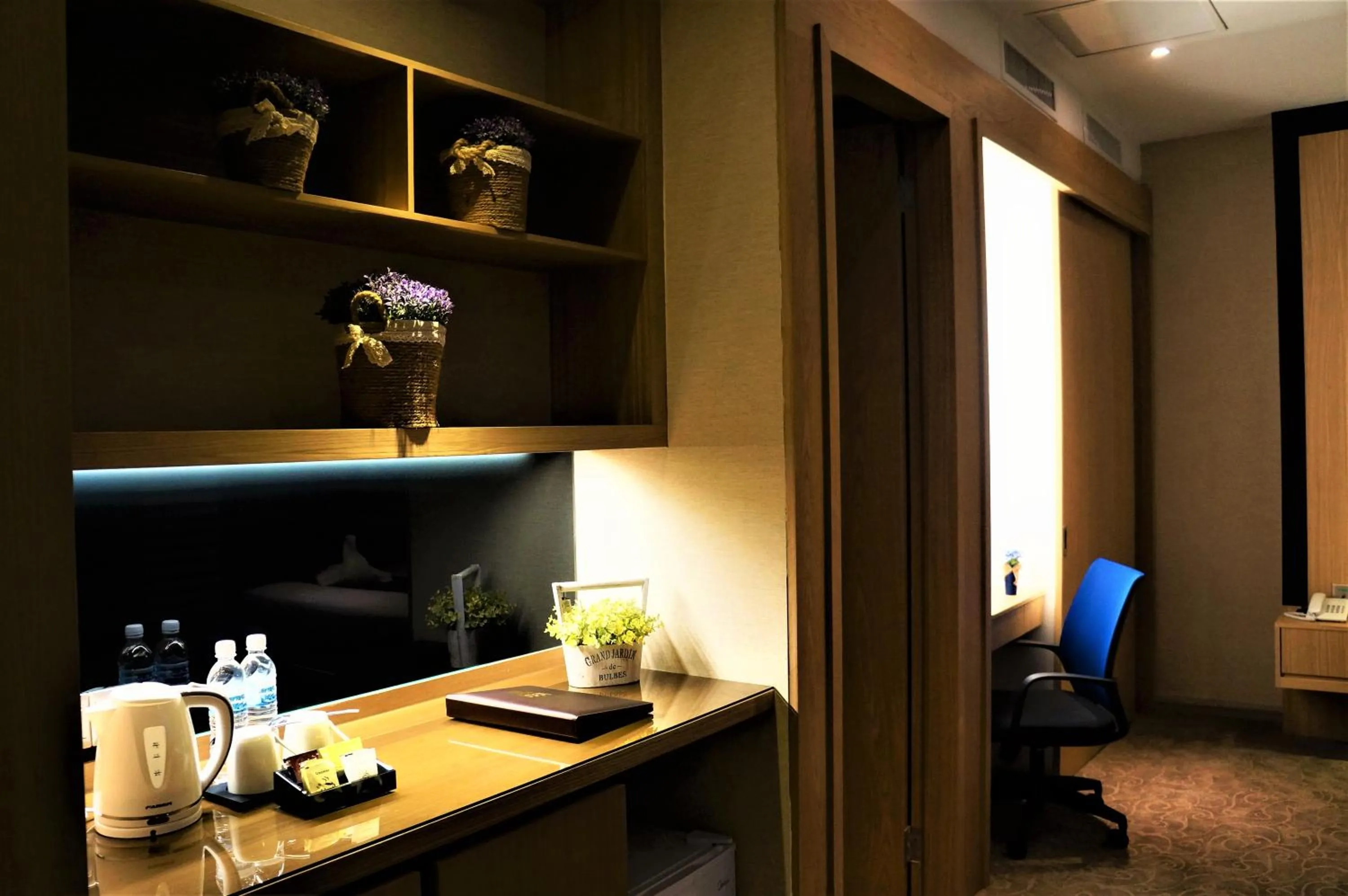 Bed in Greens Hotel & Suites