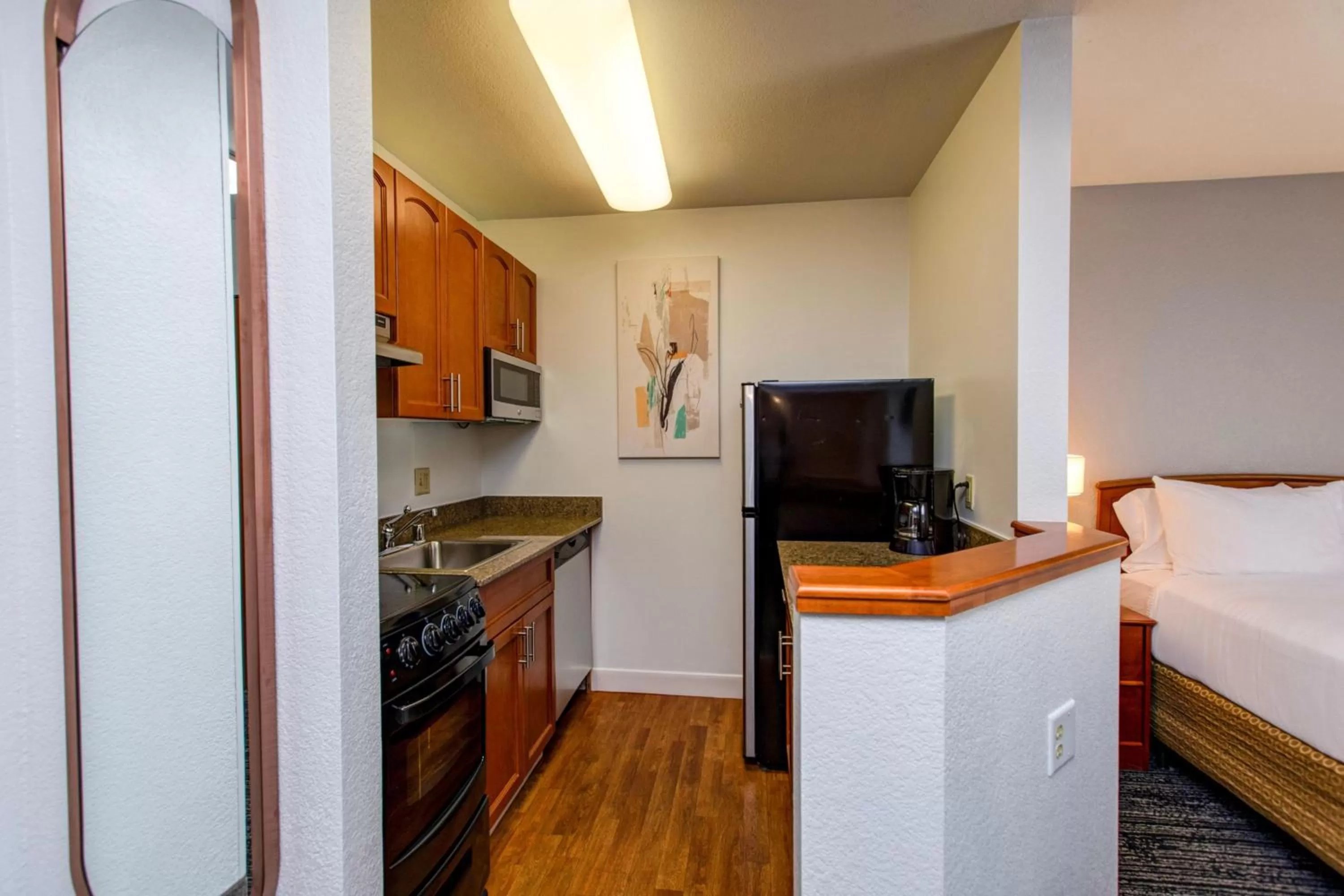 Kitchen or kitchenette, Bed in TownePlace Suites Colorado Springs