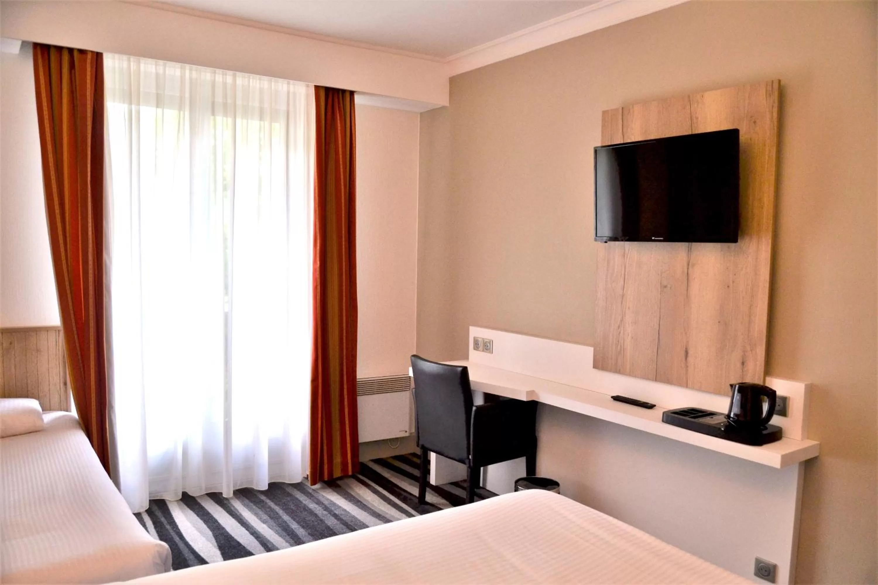 Photo of the whole room, Bed in Kyriad Hotel Tours Centre