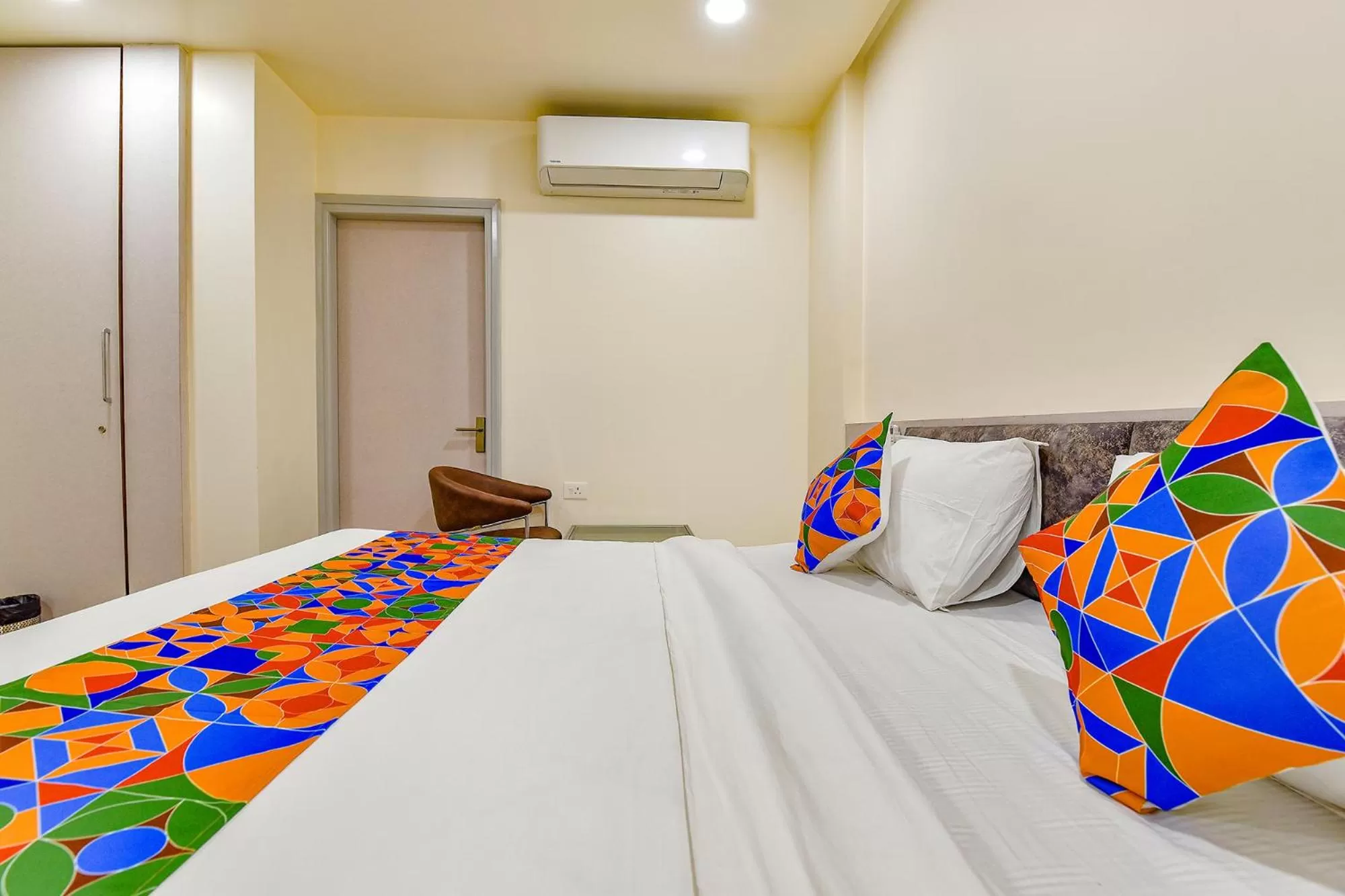 Bed in FabHotel Prime Rudra
