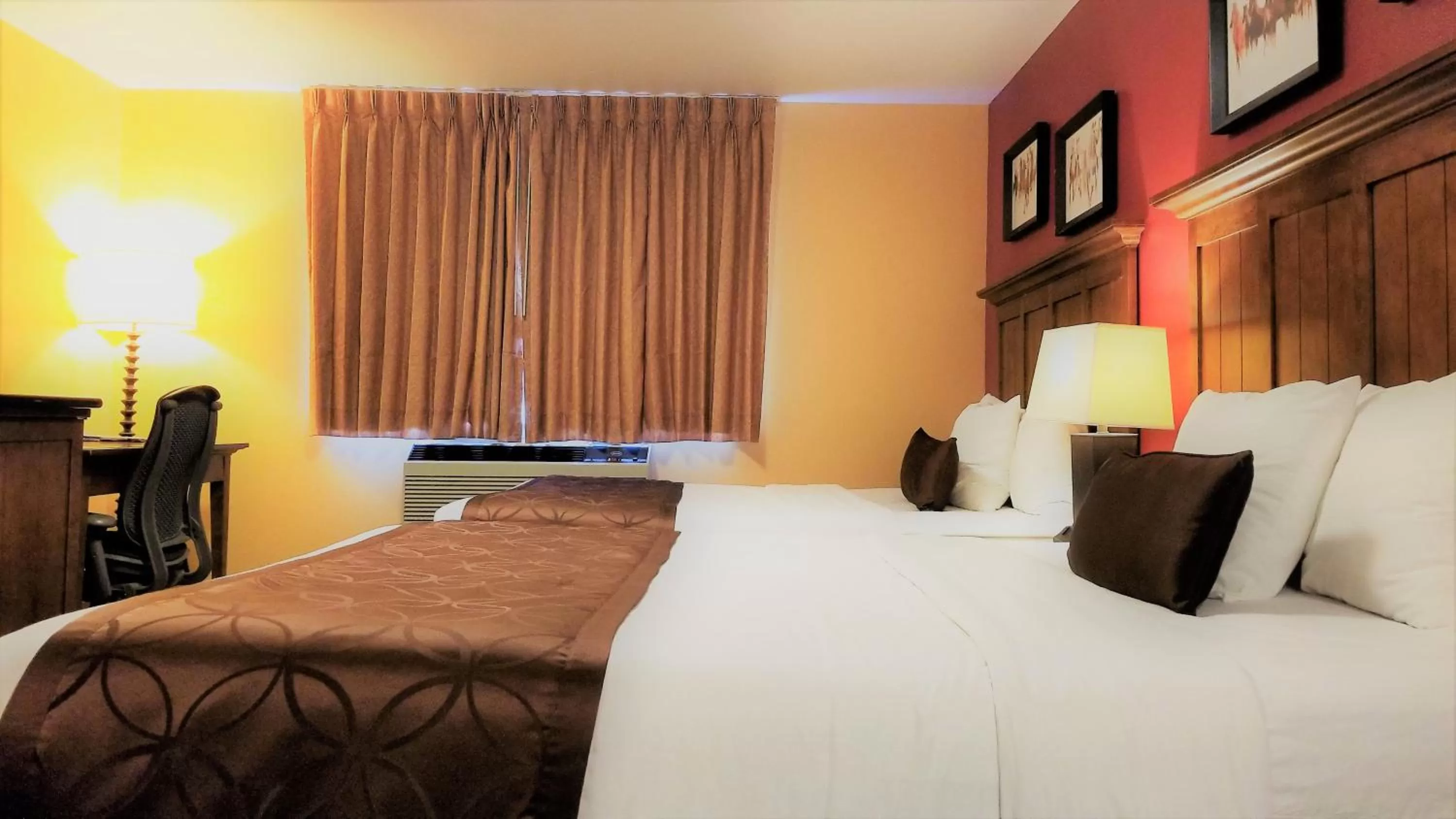 Bed in The Royal Victorian Motel