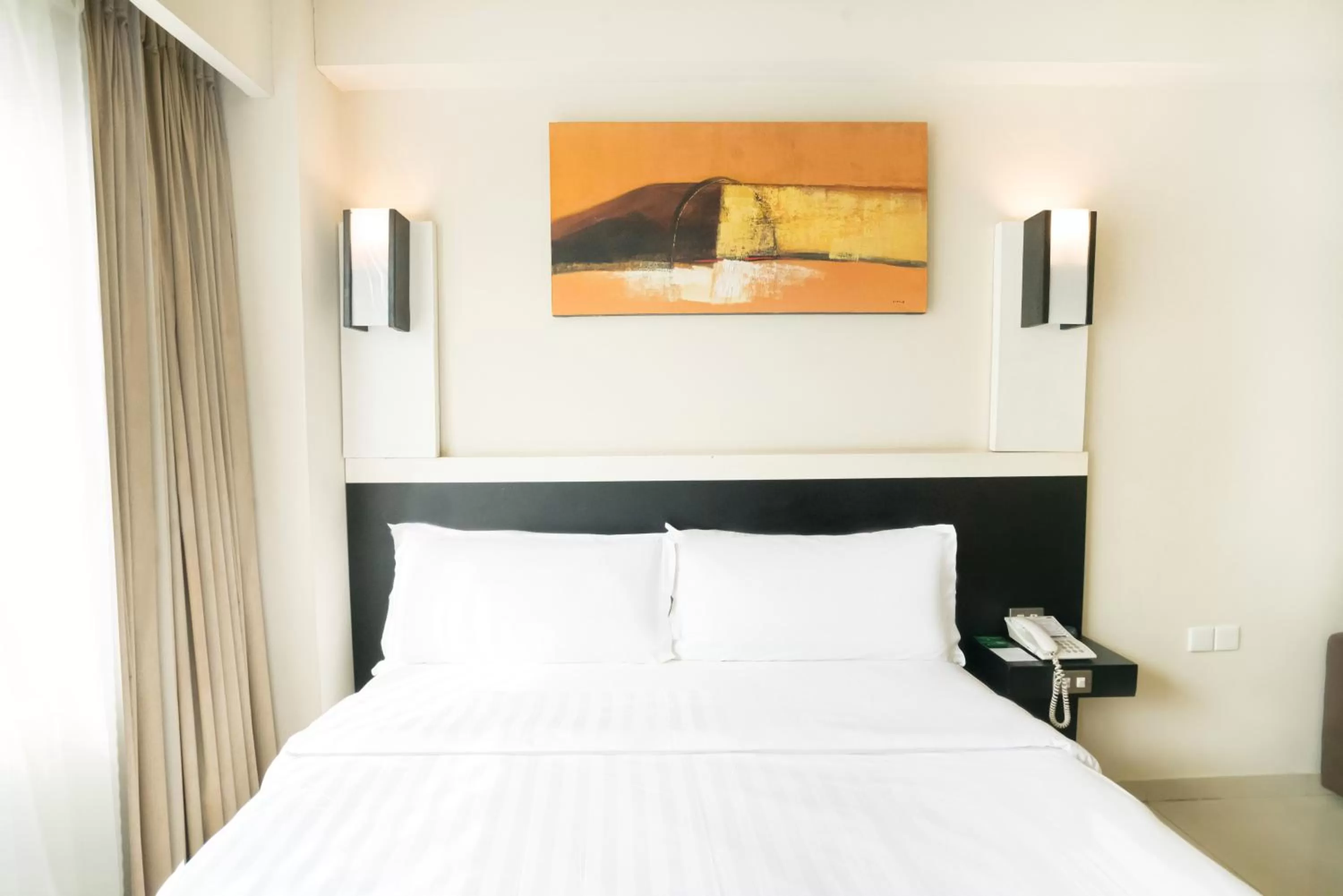 Bed in Aston Denpasar Hotel & Convention