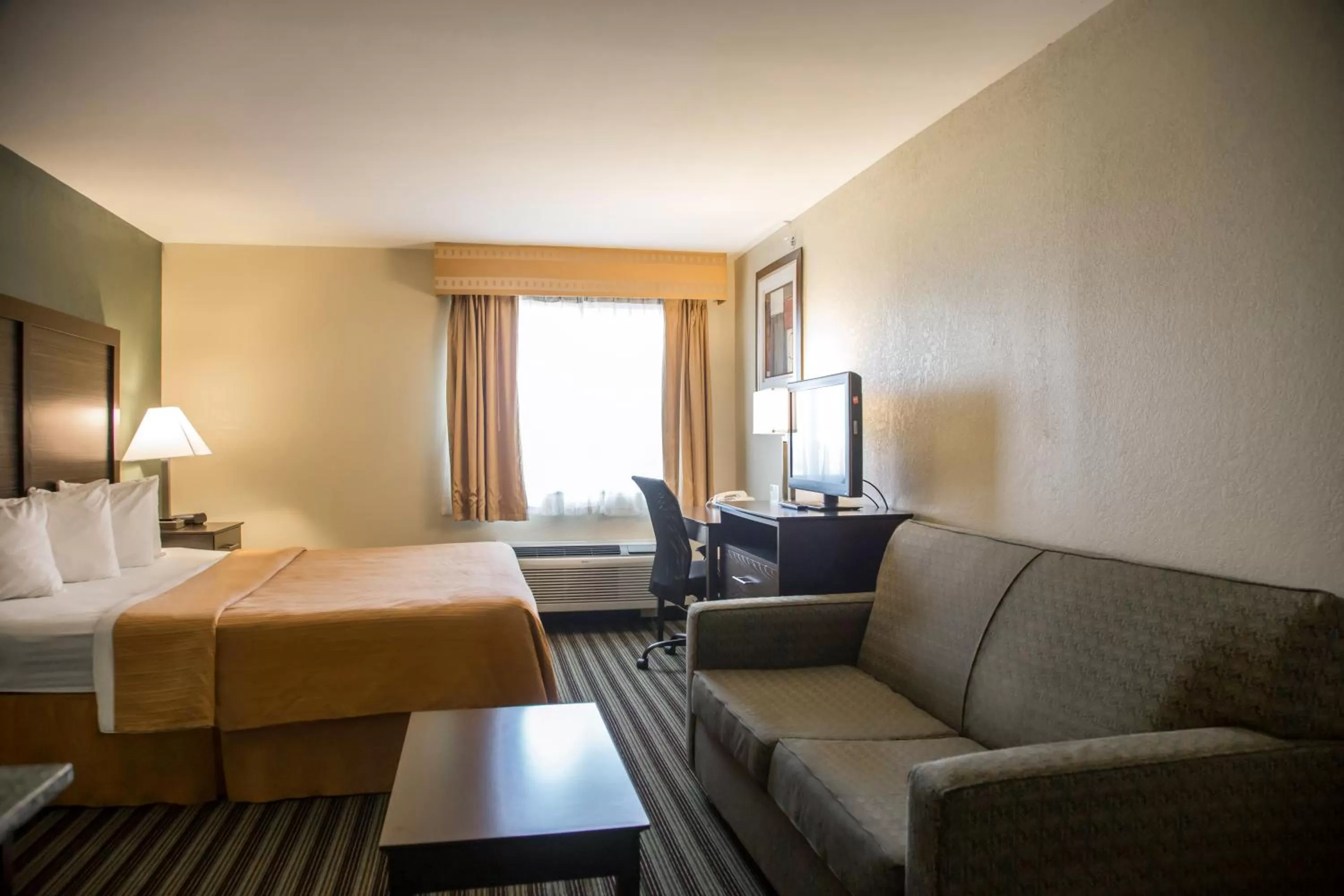 Bed in Quality Inn & Suites Loves Park near Rockford