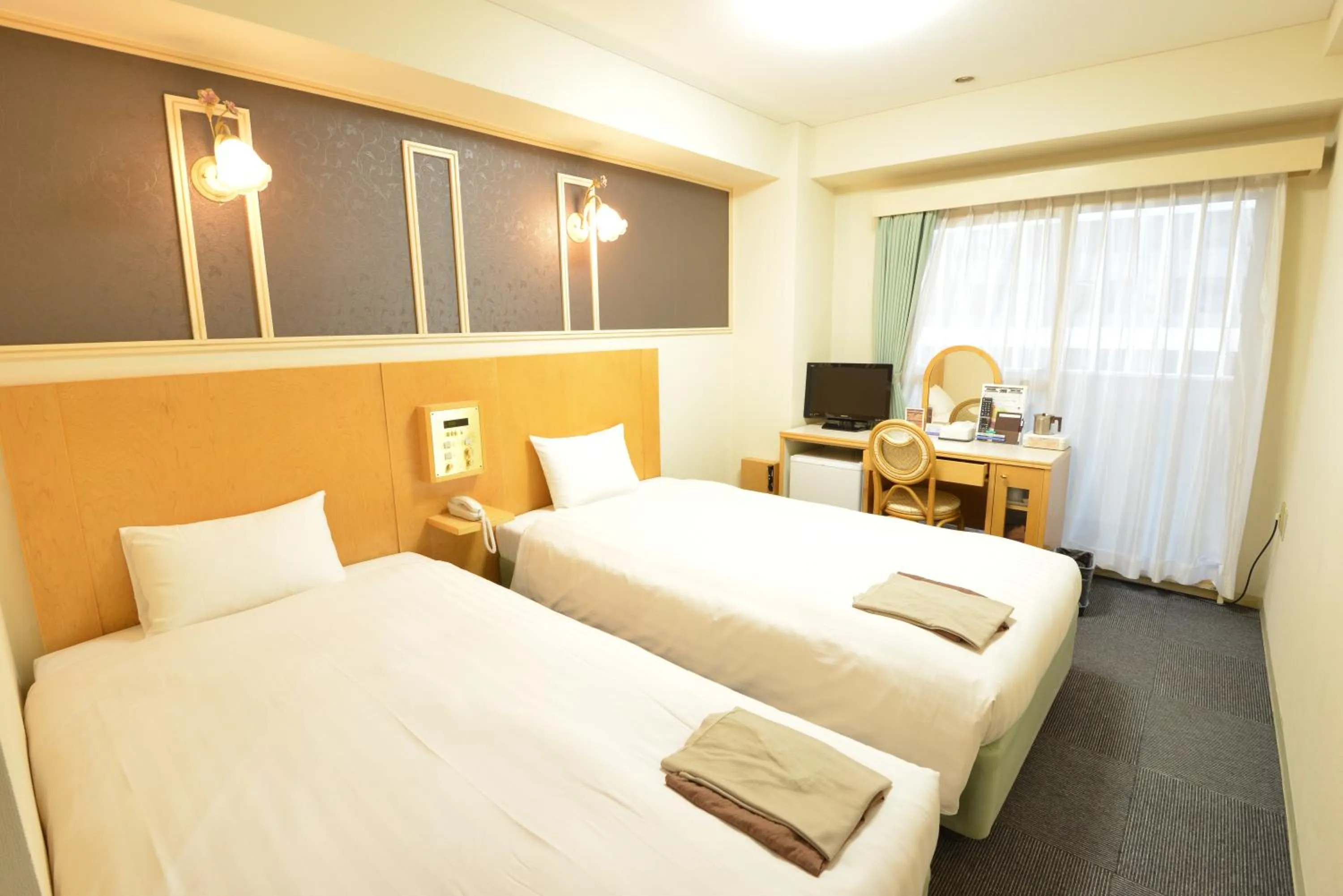 Bed in Hotel Marutani