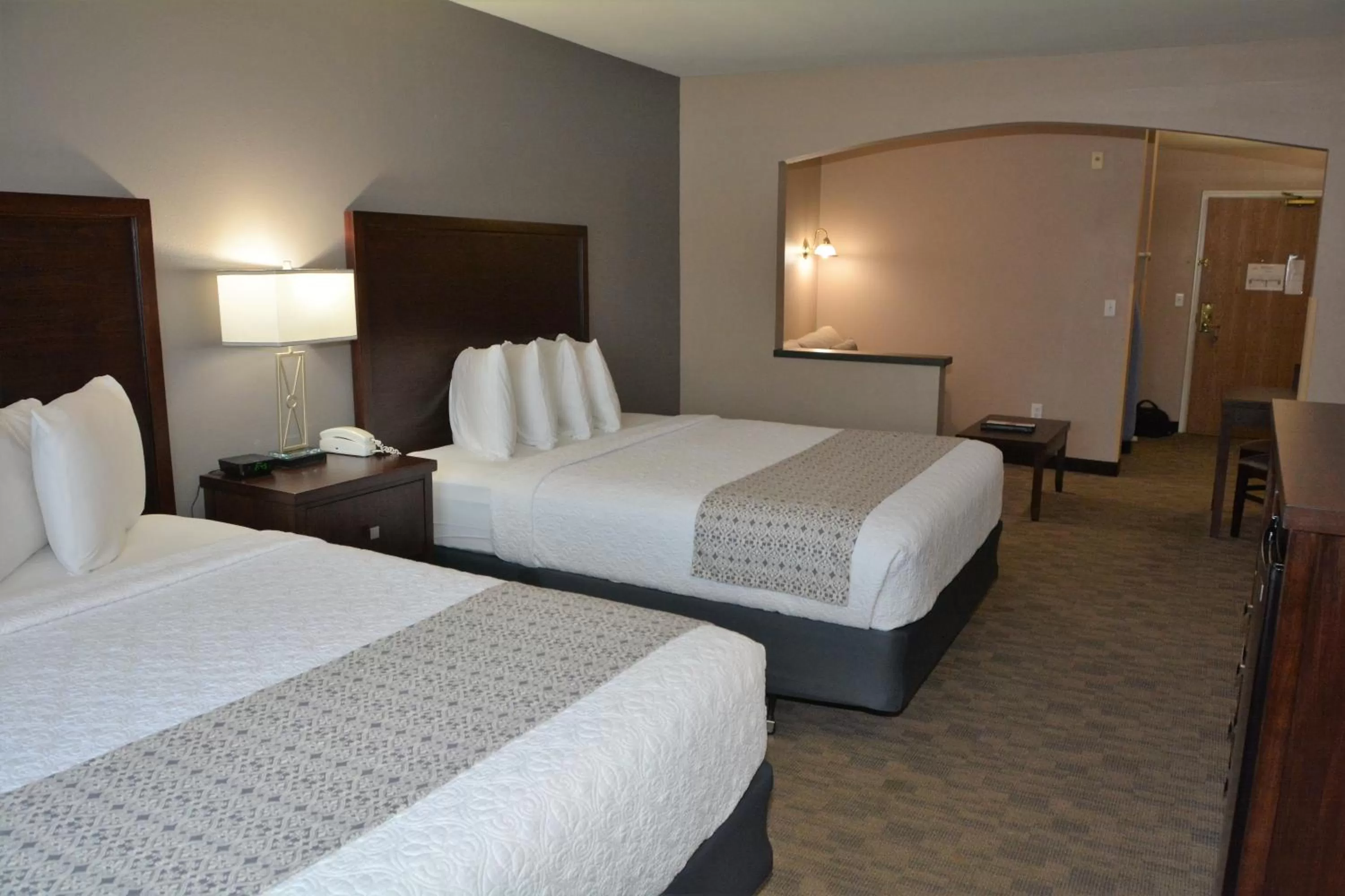 Bed in FairBridge Inn & Suites DuPont
