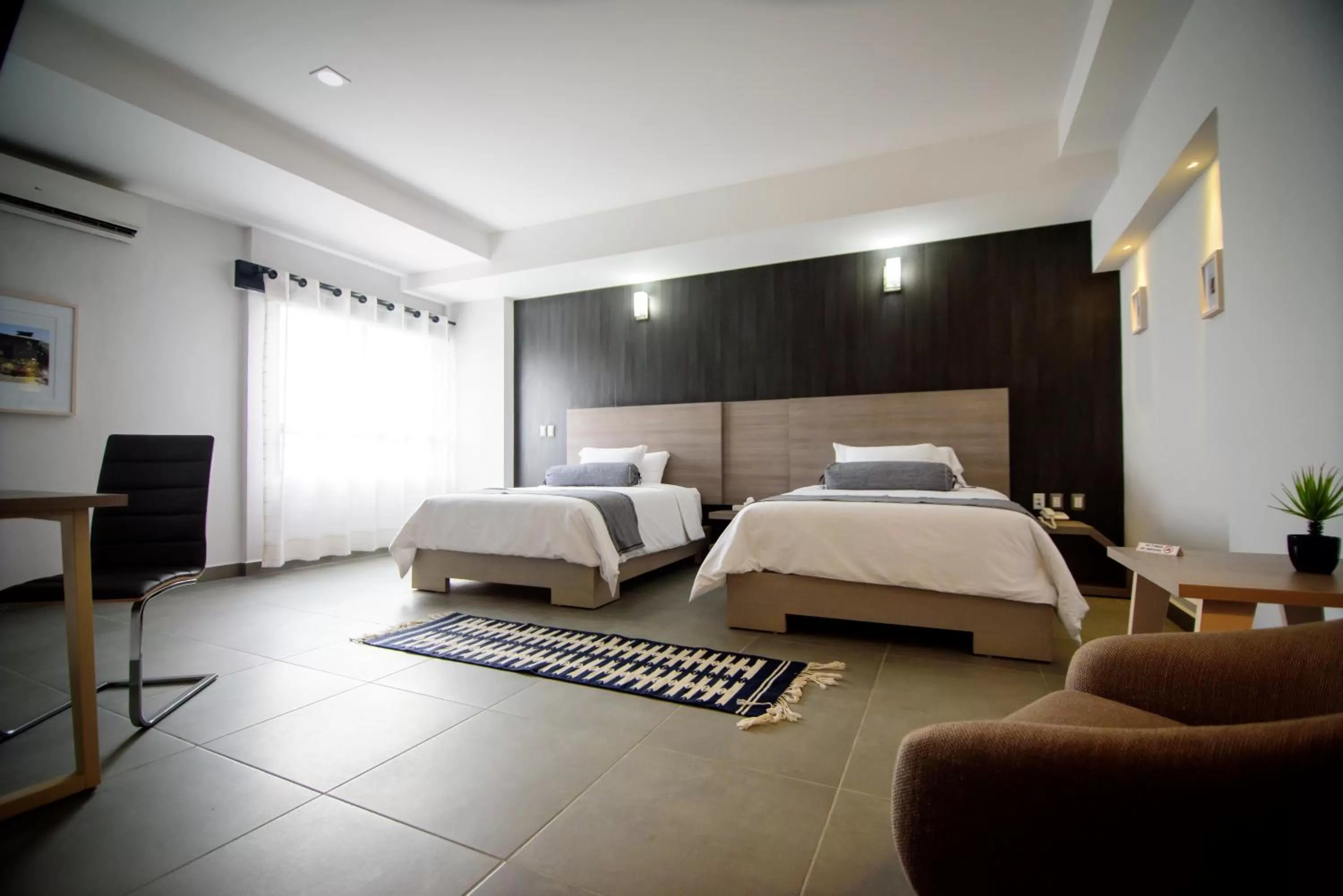 Photo of the whole room, Bed in Maria Ines Hotel Suite