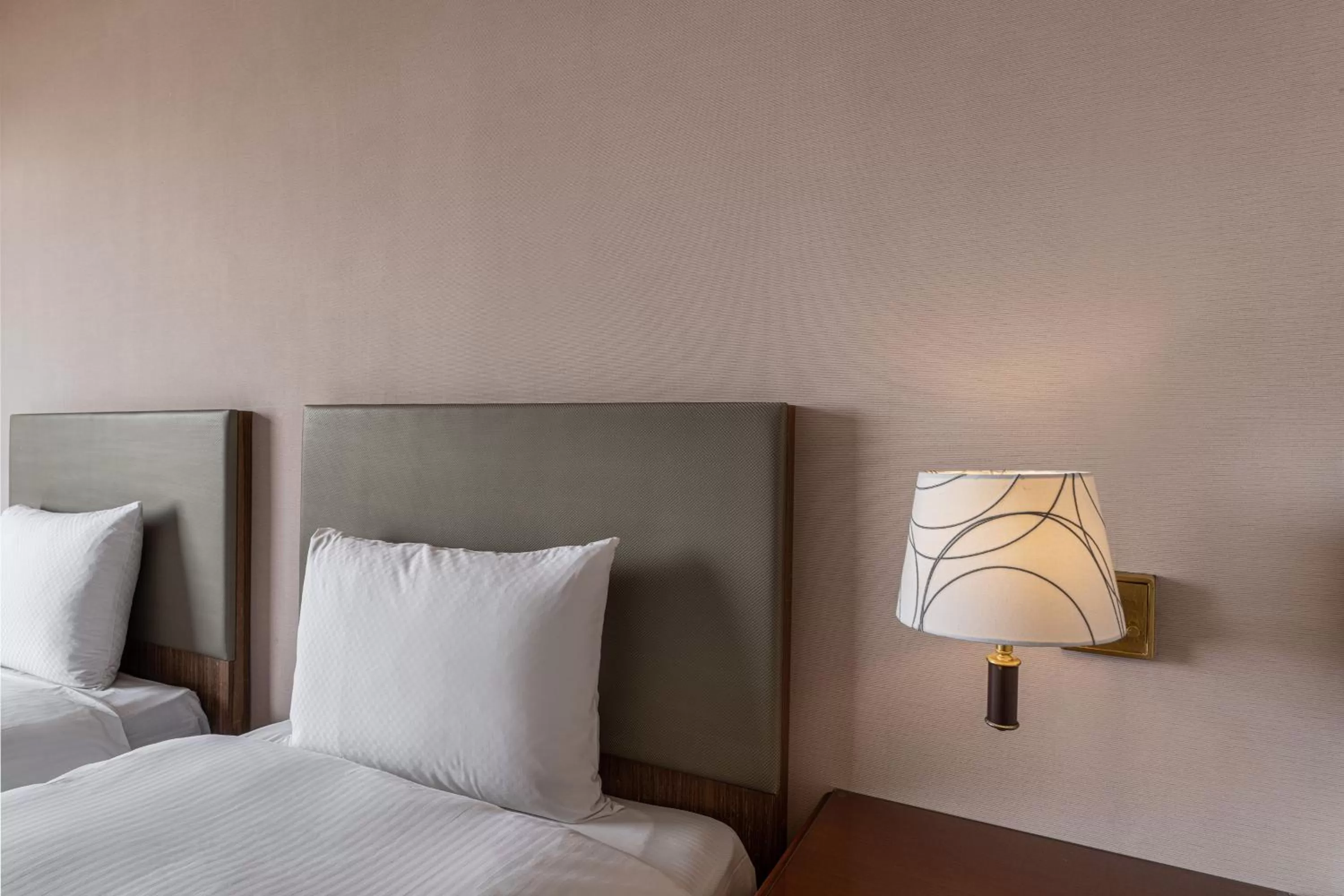 Bed in Hotel j-Metropolis