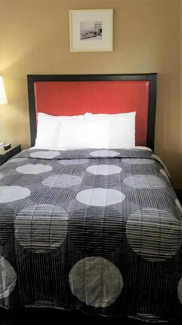 Bed in The Simplicity Inn