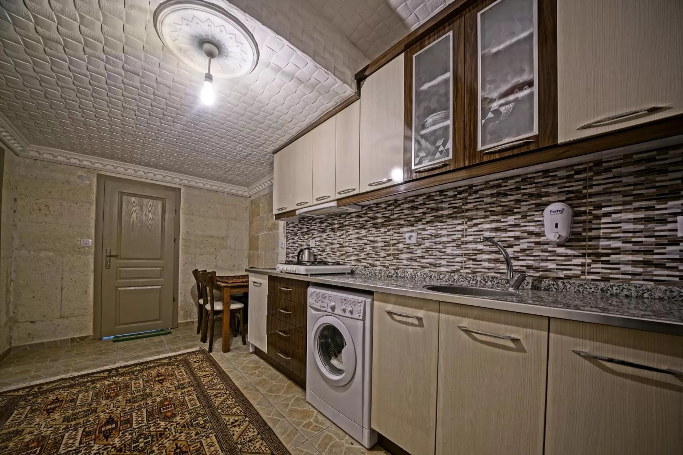 Kitchen or kitchenette in Epoch Stone House