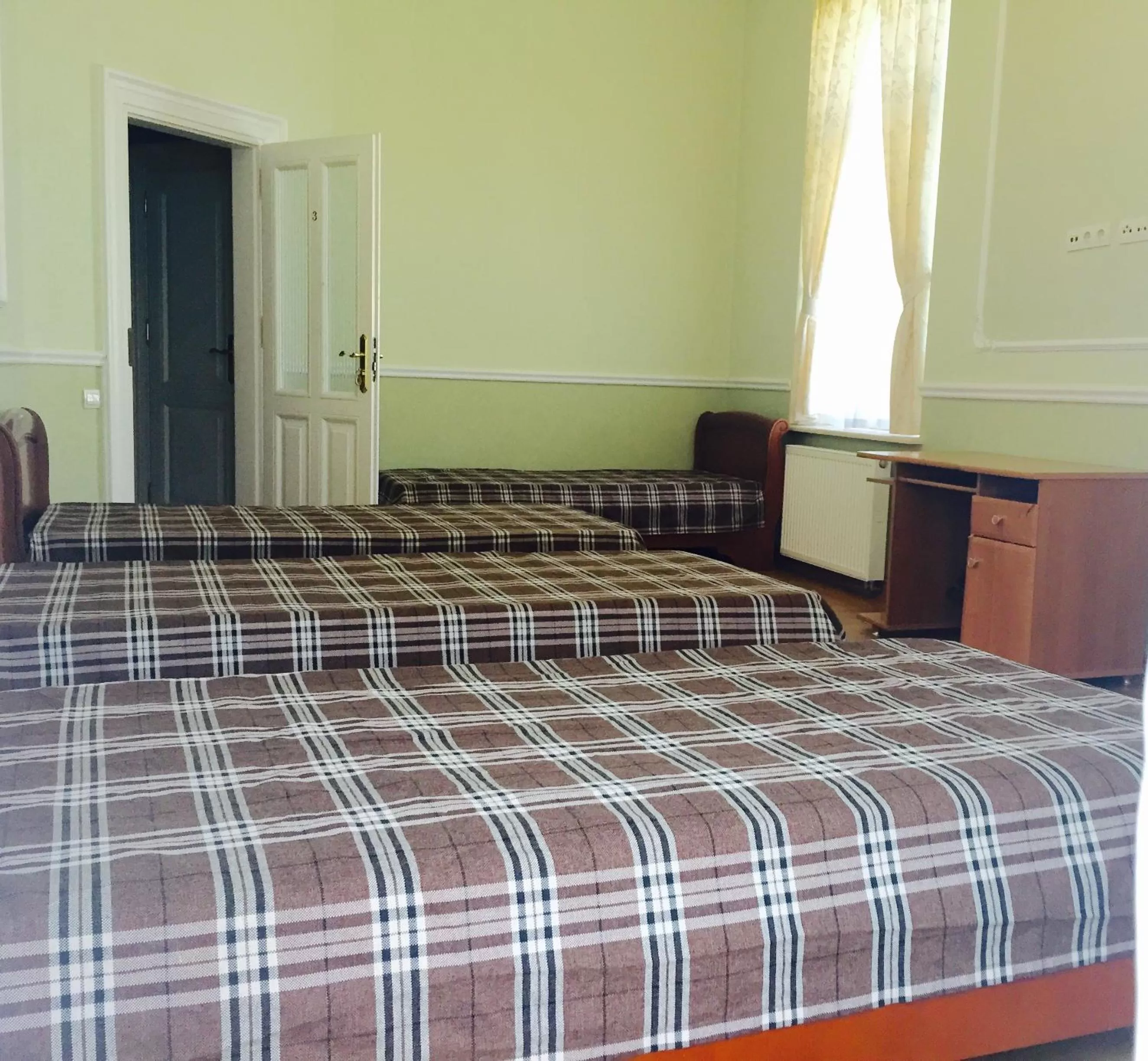 Bed in Mini-Hotel Under The Roof