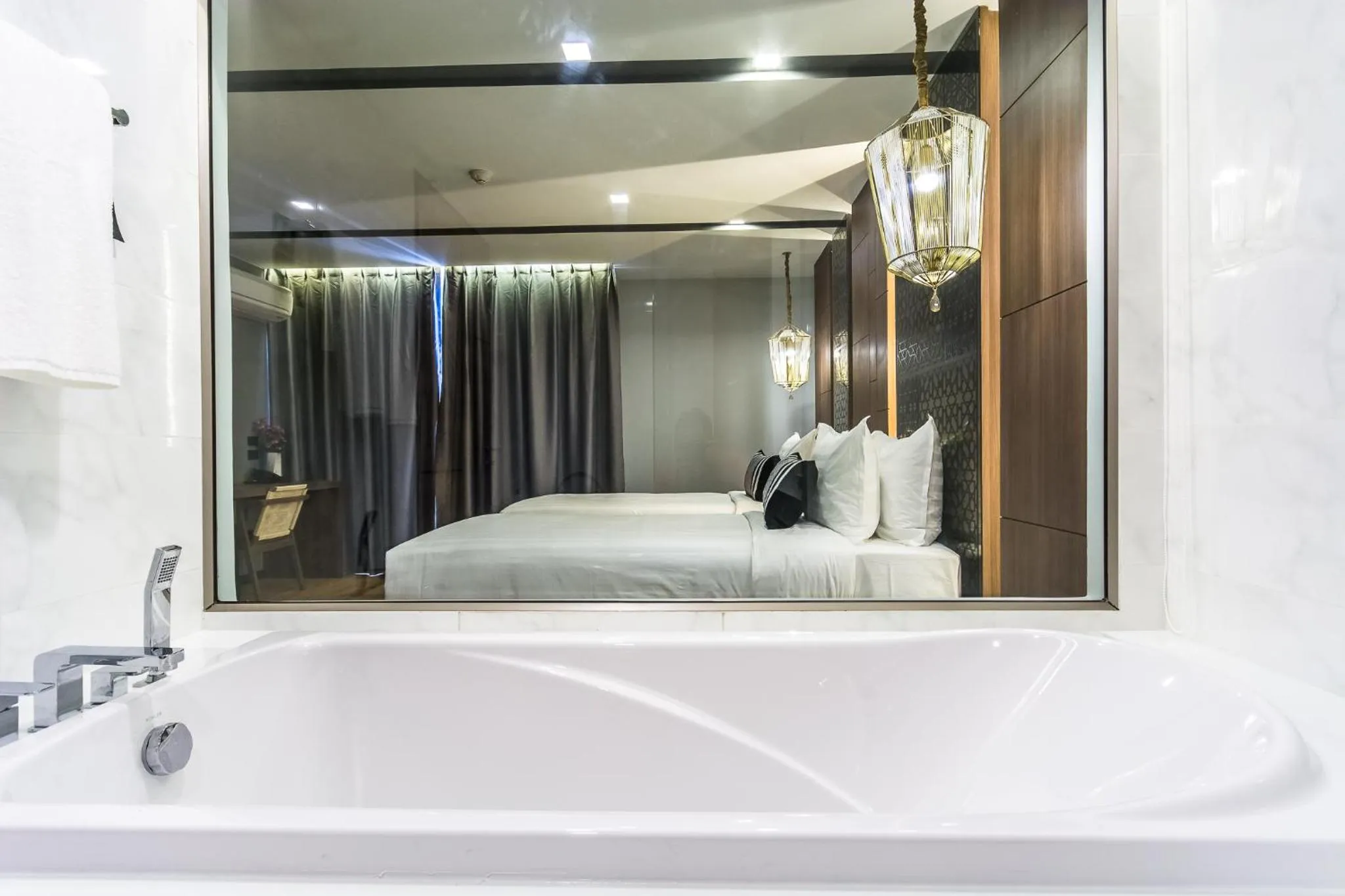 Bathroom, Bed in Stay with Nimman Chiang Mai