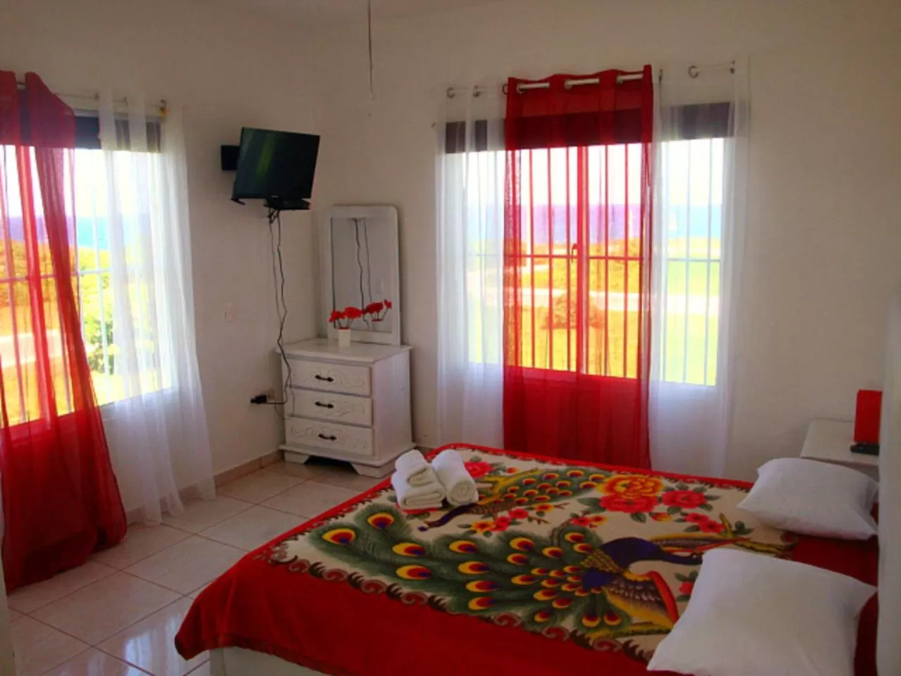 Bed in El Malecon B&B Hotel