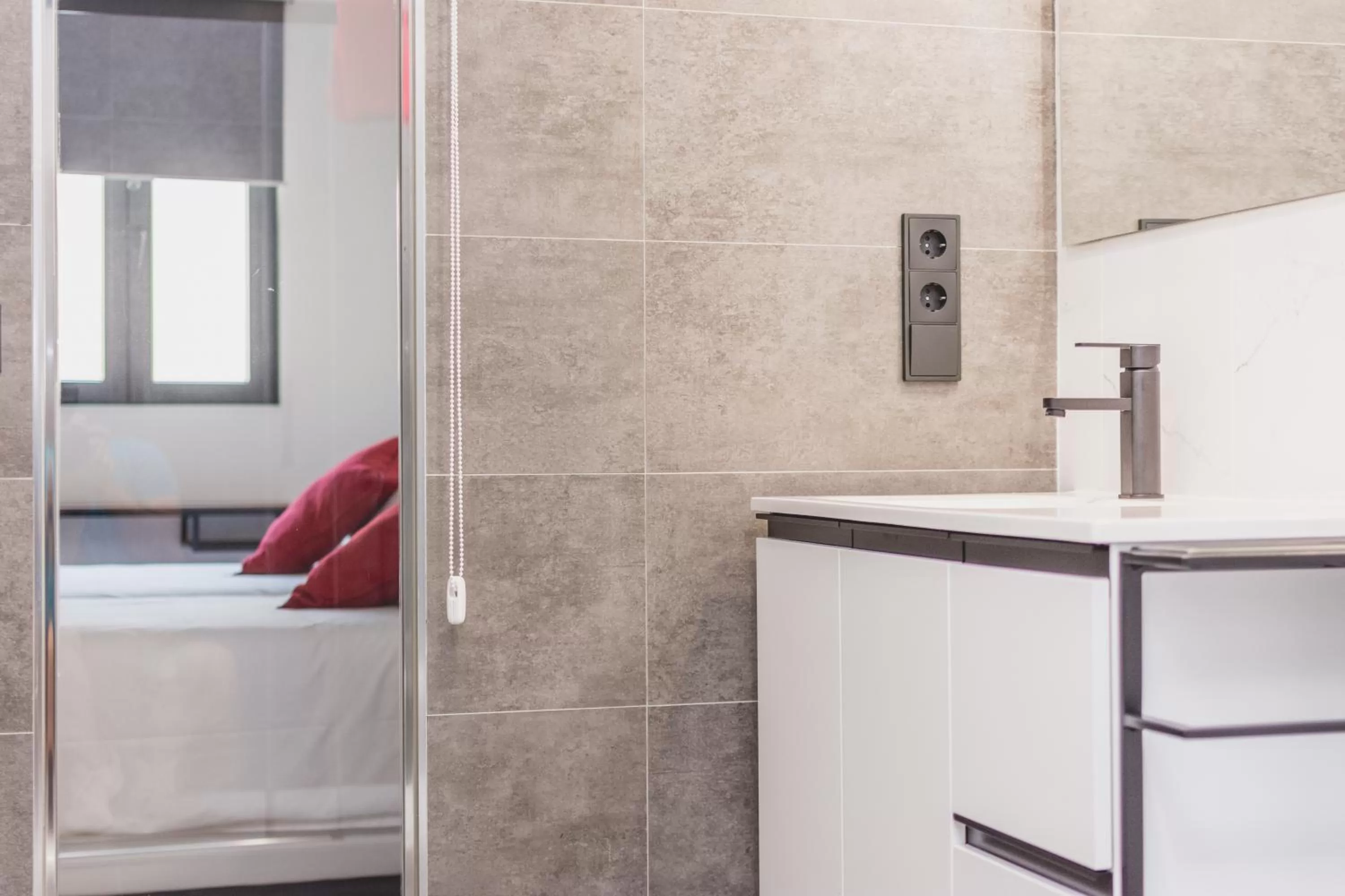 Bathroom, Bed in Slow León Apartamentos Turísticos