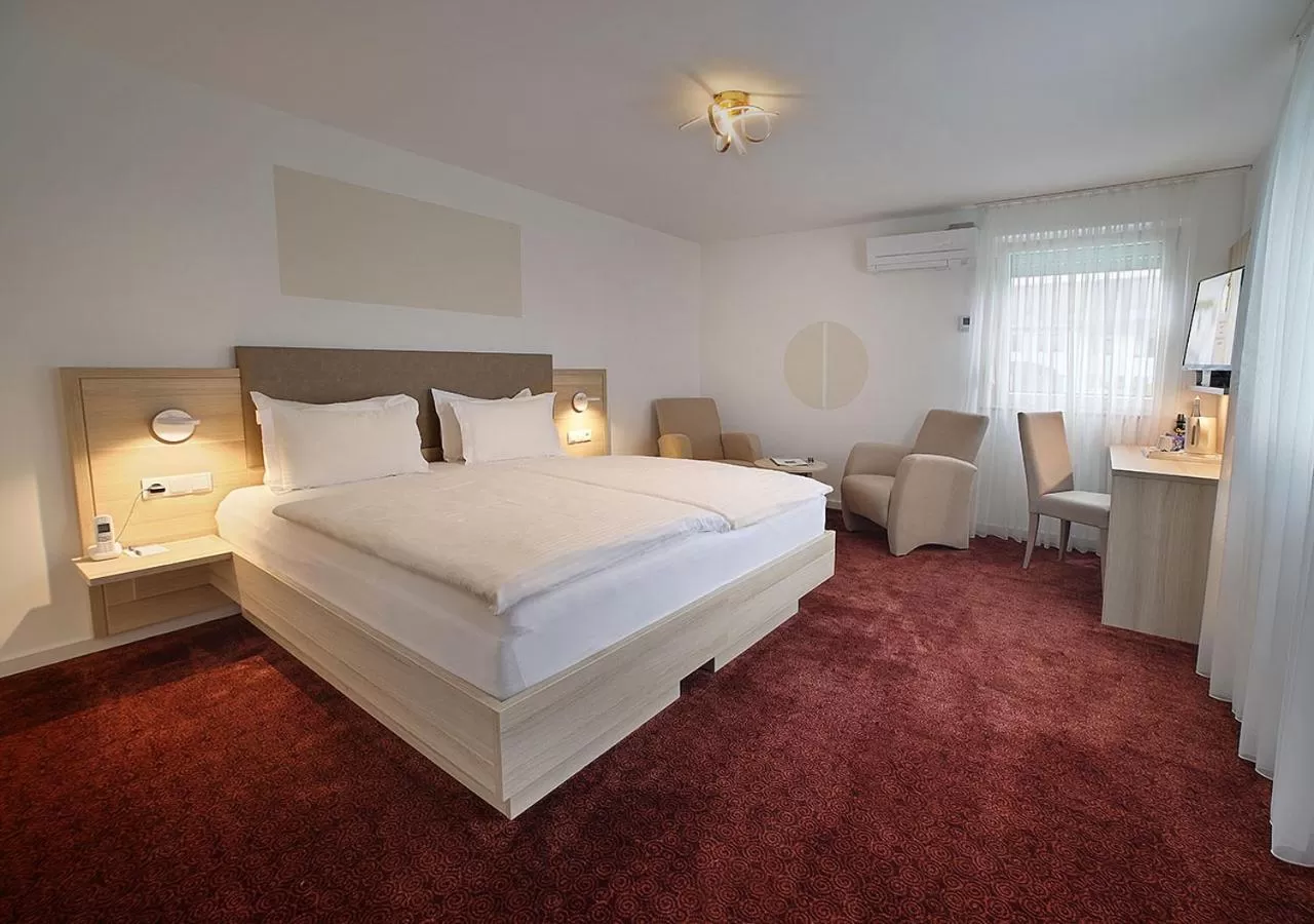 Bed in Hotel Brenner