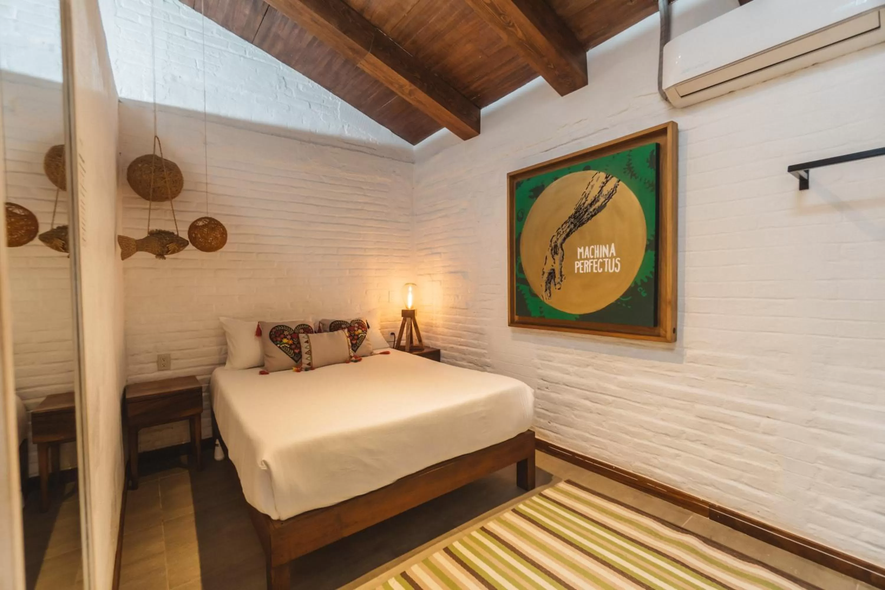 Bed in Amaia Boutique Hotel