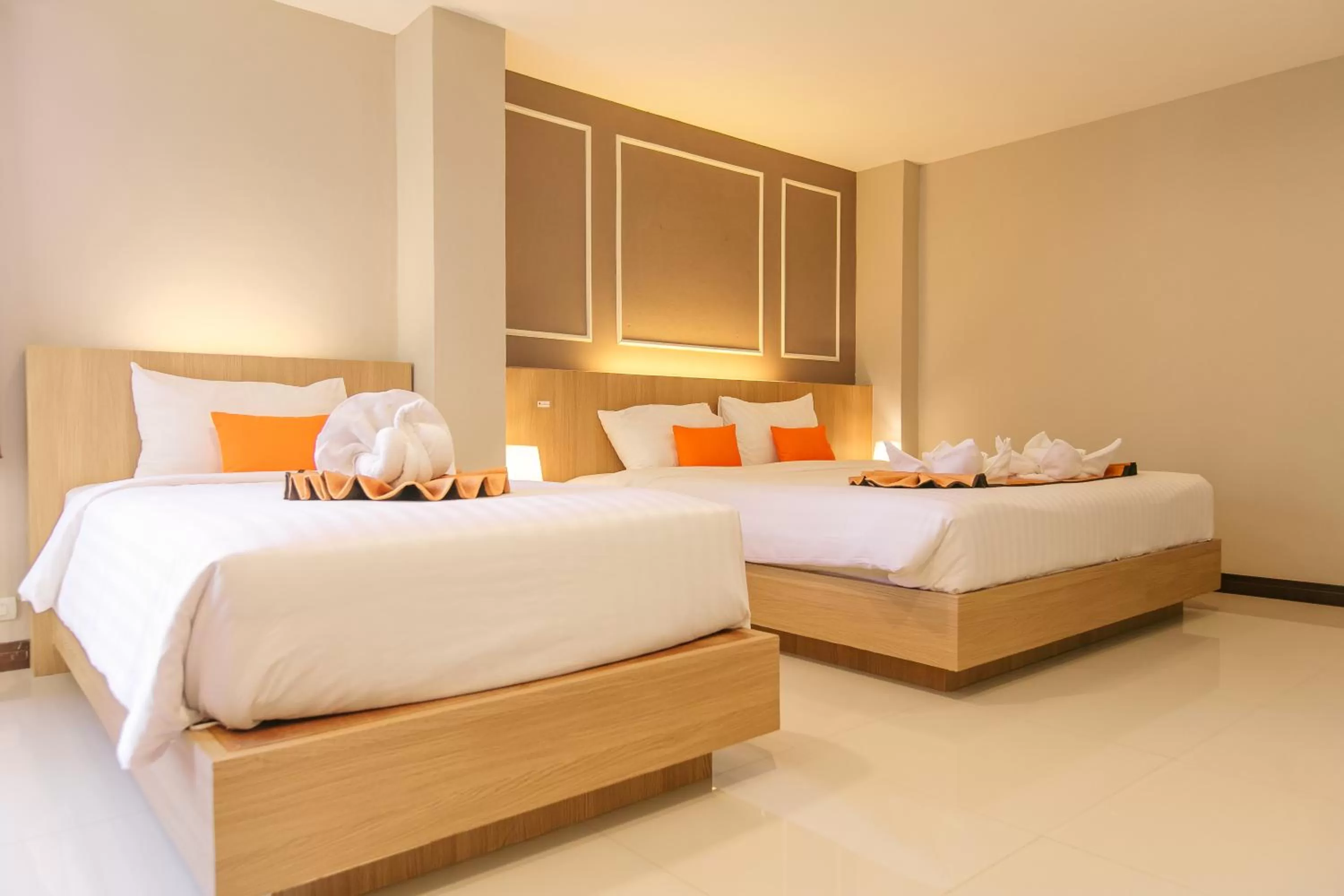 Bed in De Hug Hotel & Residence