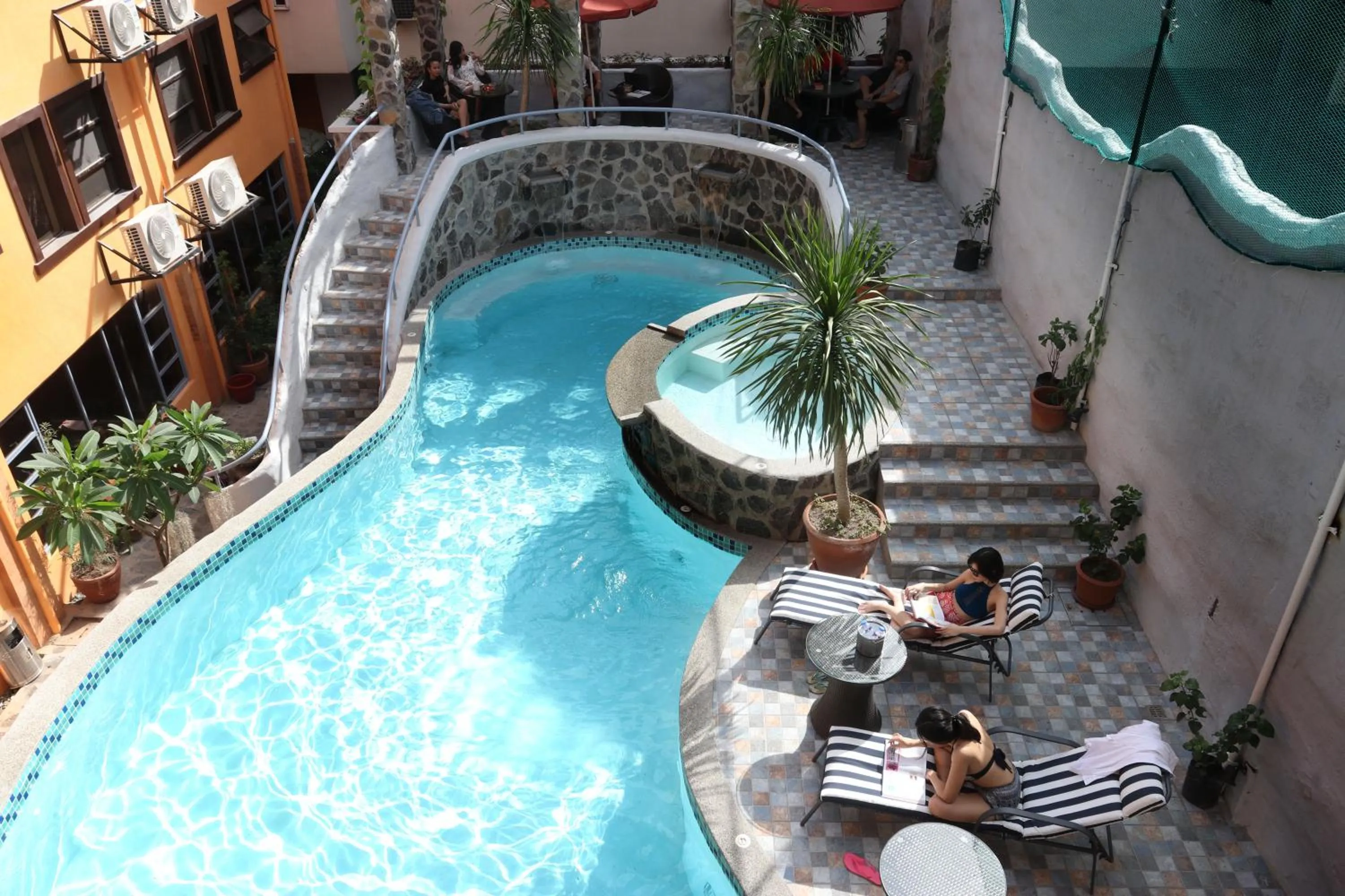 Pool view in 1775 Adriatico Suites