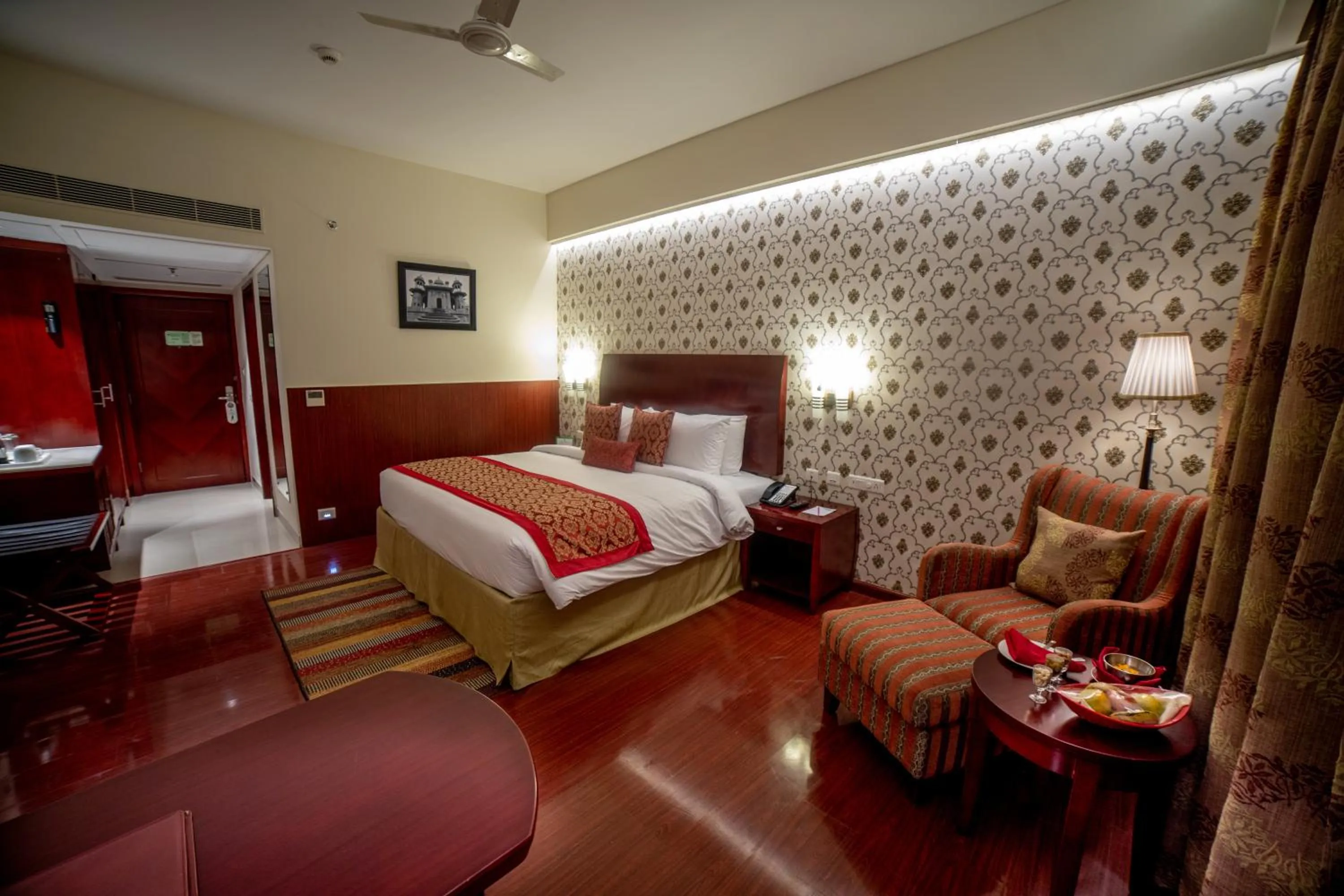 Photo of the whole room, Bed in Ramada by Wyndham Jaipur Jaisinghpura