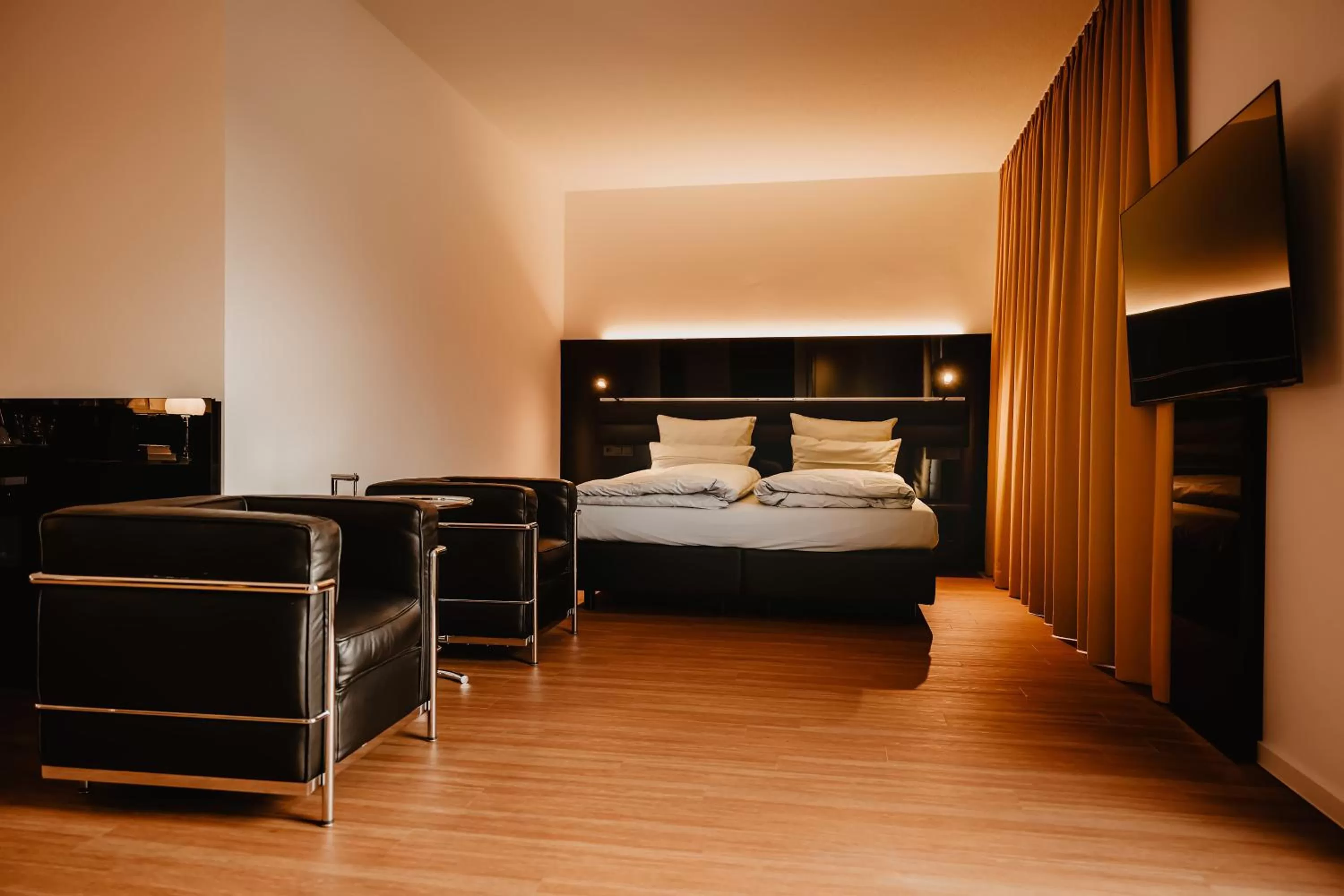 Bed in The Bridgge Grand Boutique Hotel