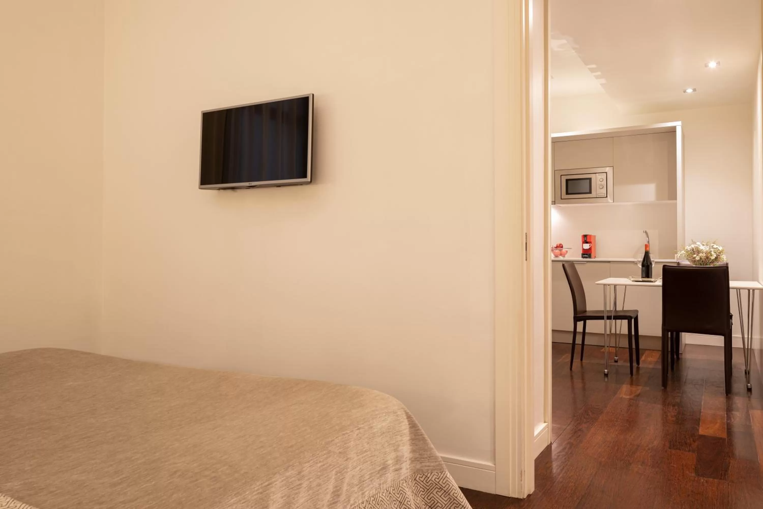 Living room, Bed in Duquesa Suites Landmark Hotel by Grup Duquessa