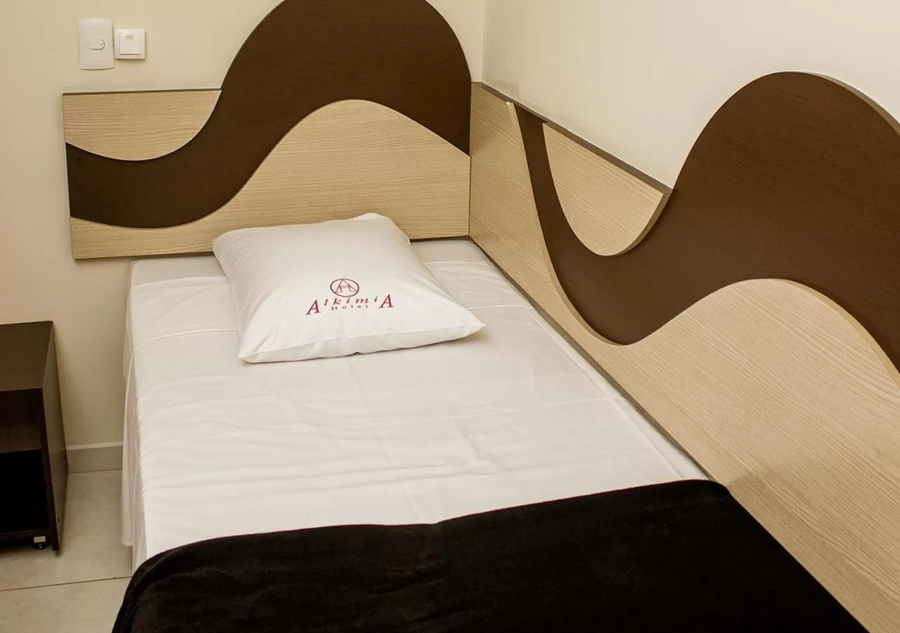 Bed in Alkimia Hotel