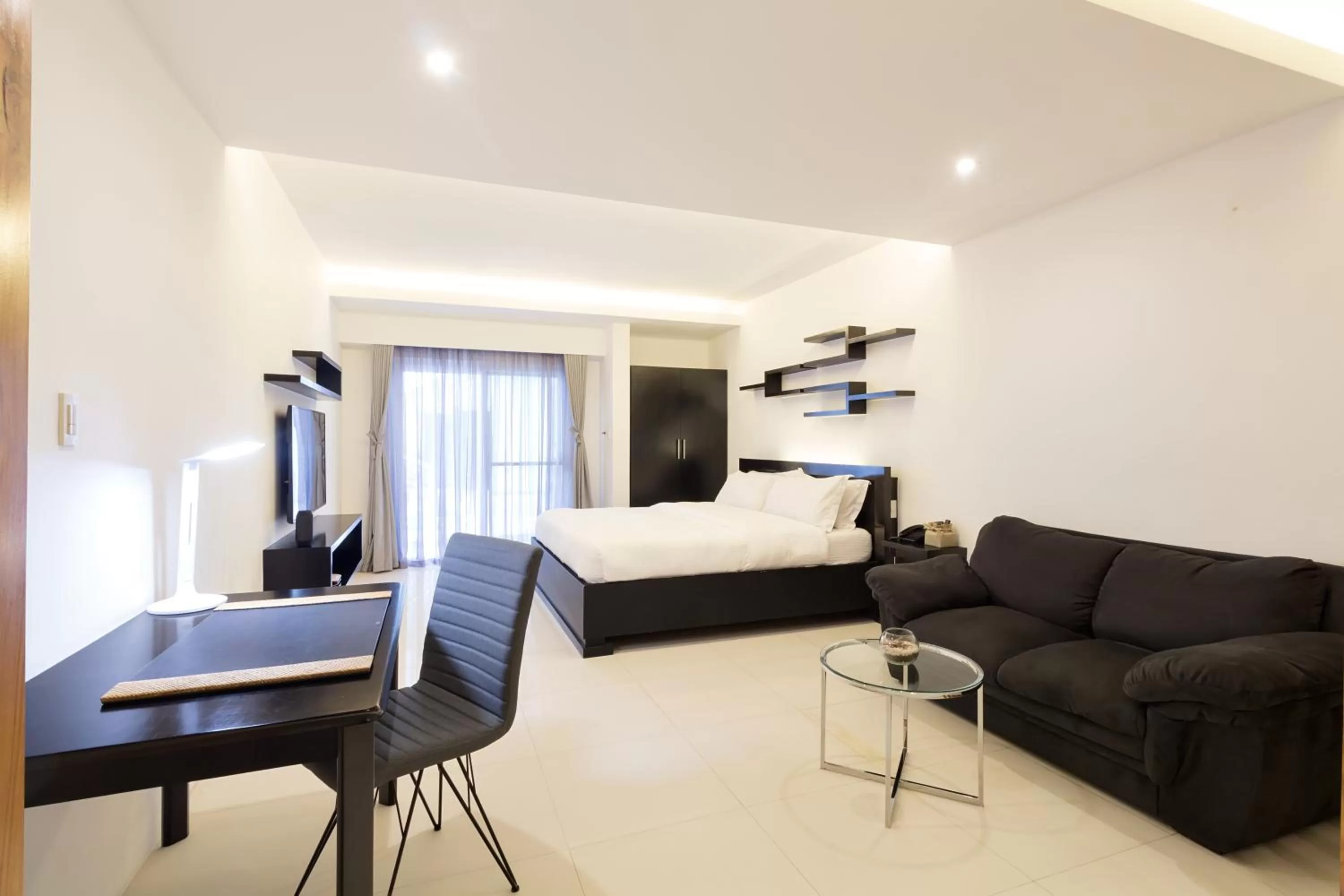 Photo of the whole room, Bed in Winds Boutique Hotel