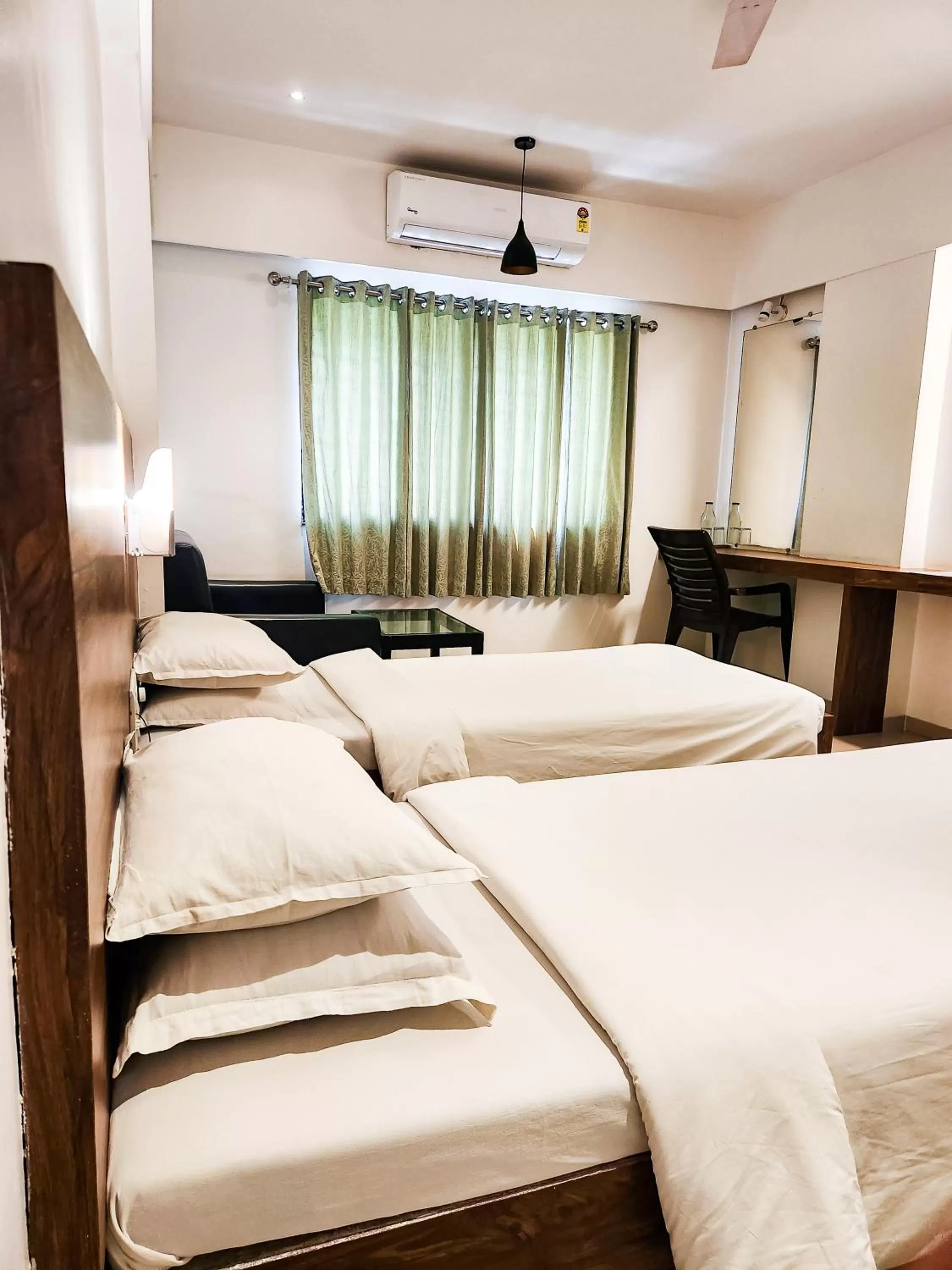 Bed in Hotel Rajwada Aurangabad