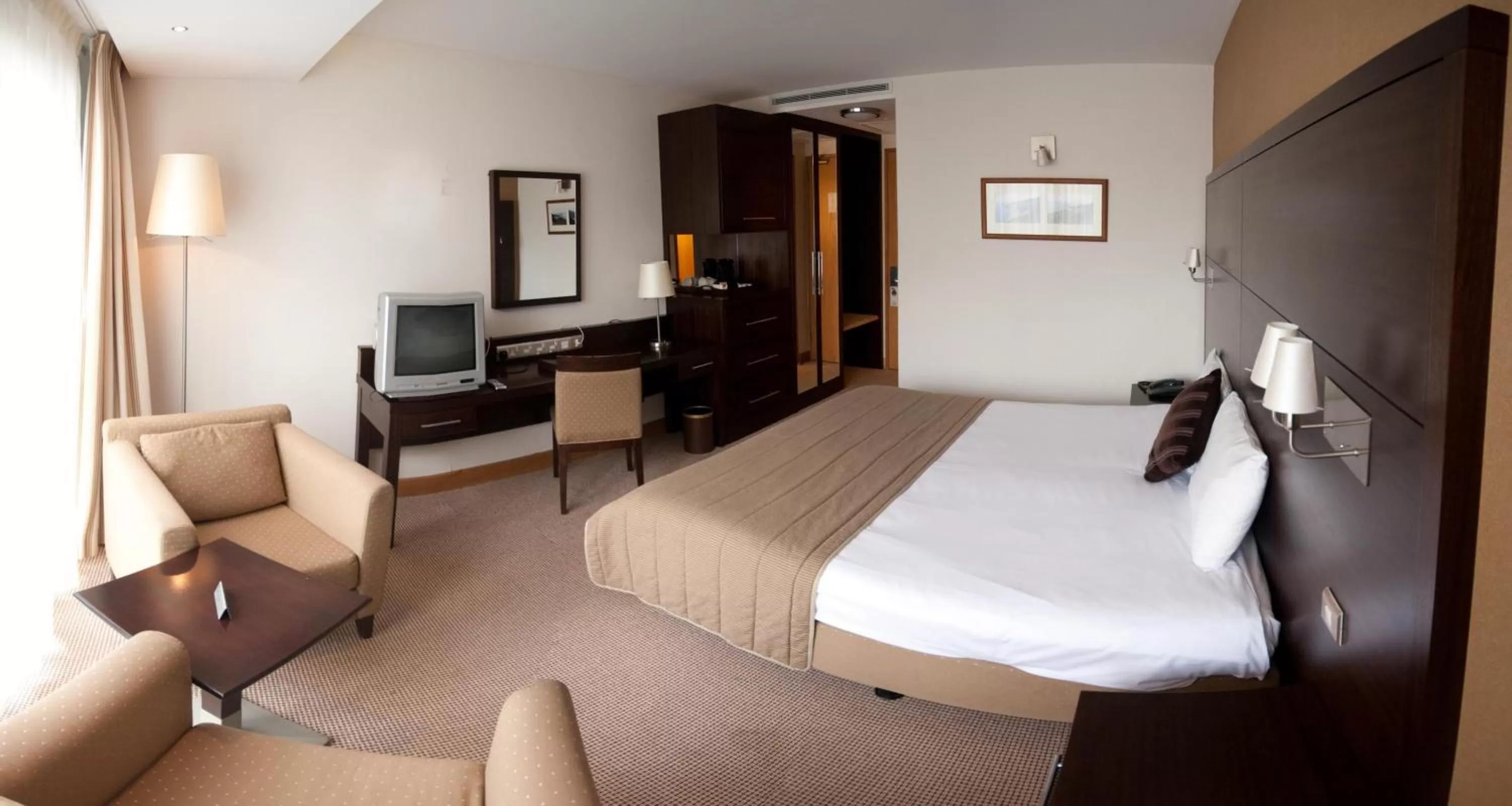 Photo of the whole room, Bed in White Sands Hotel