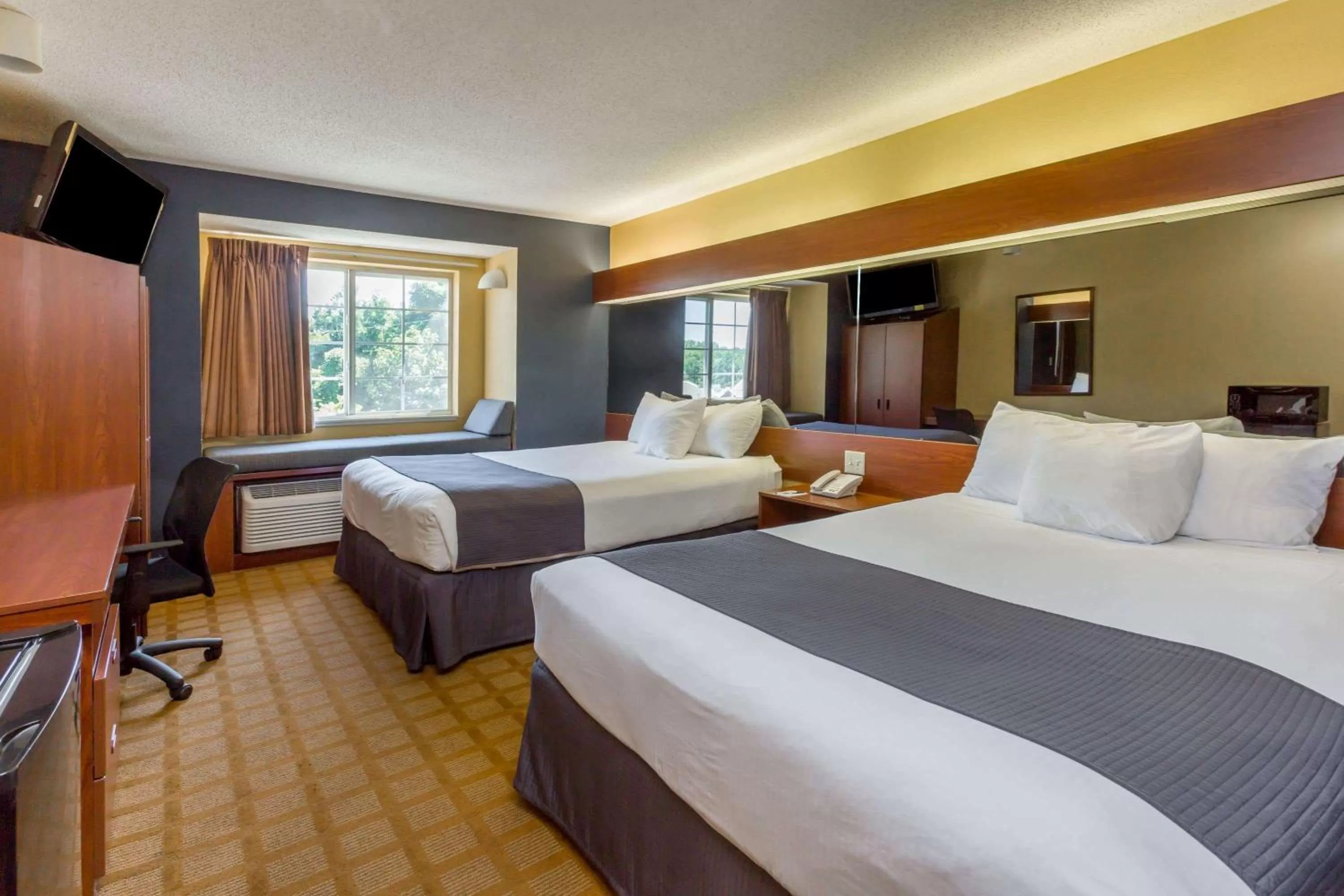 Photo of the whole room, Bed in Microtel Inn & Suites by Wyndham Hillsborough