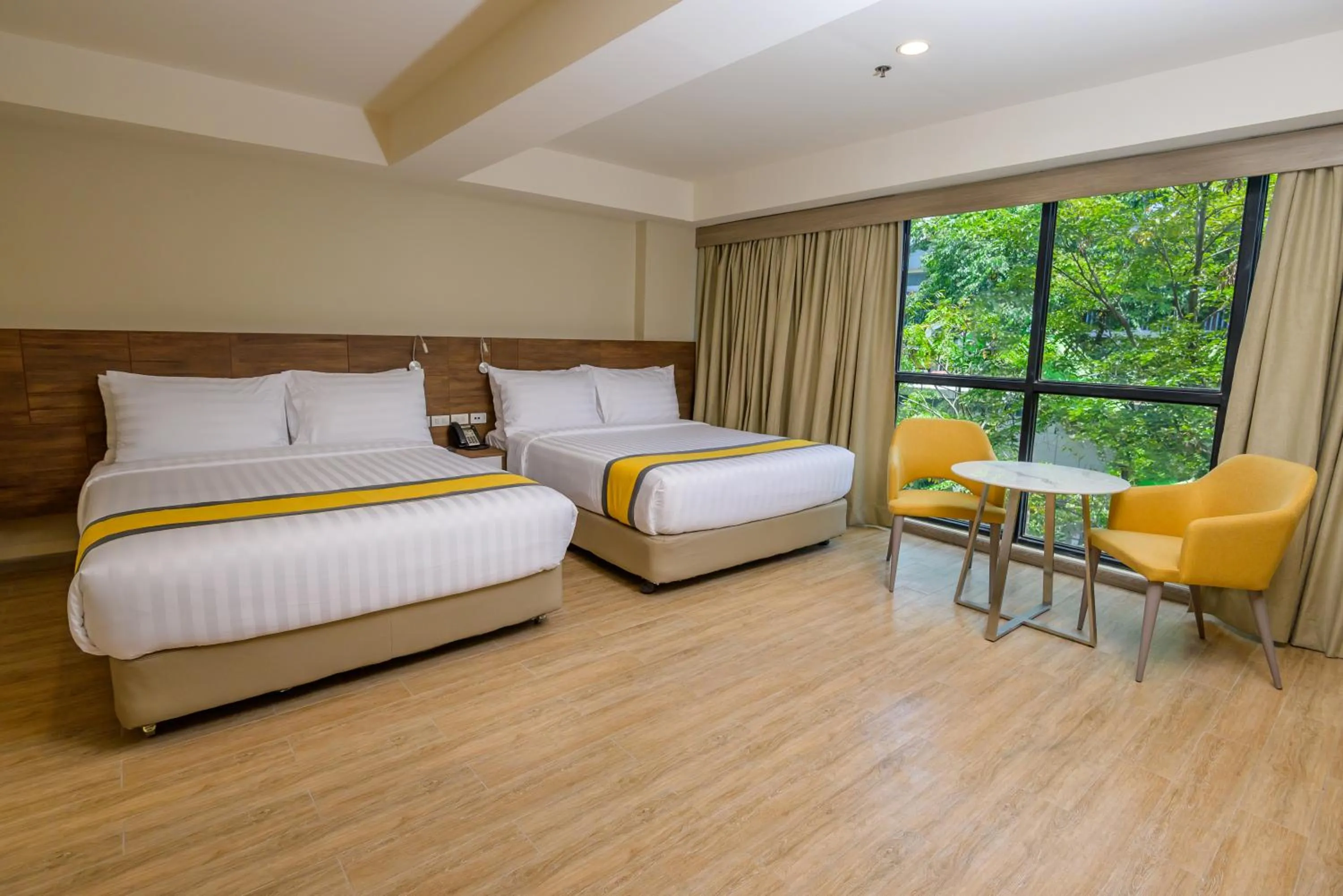Bed in SureStay Plus by Best Western Cebu City