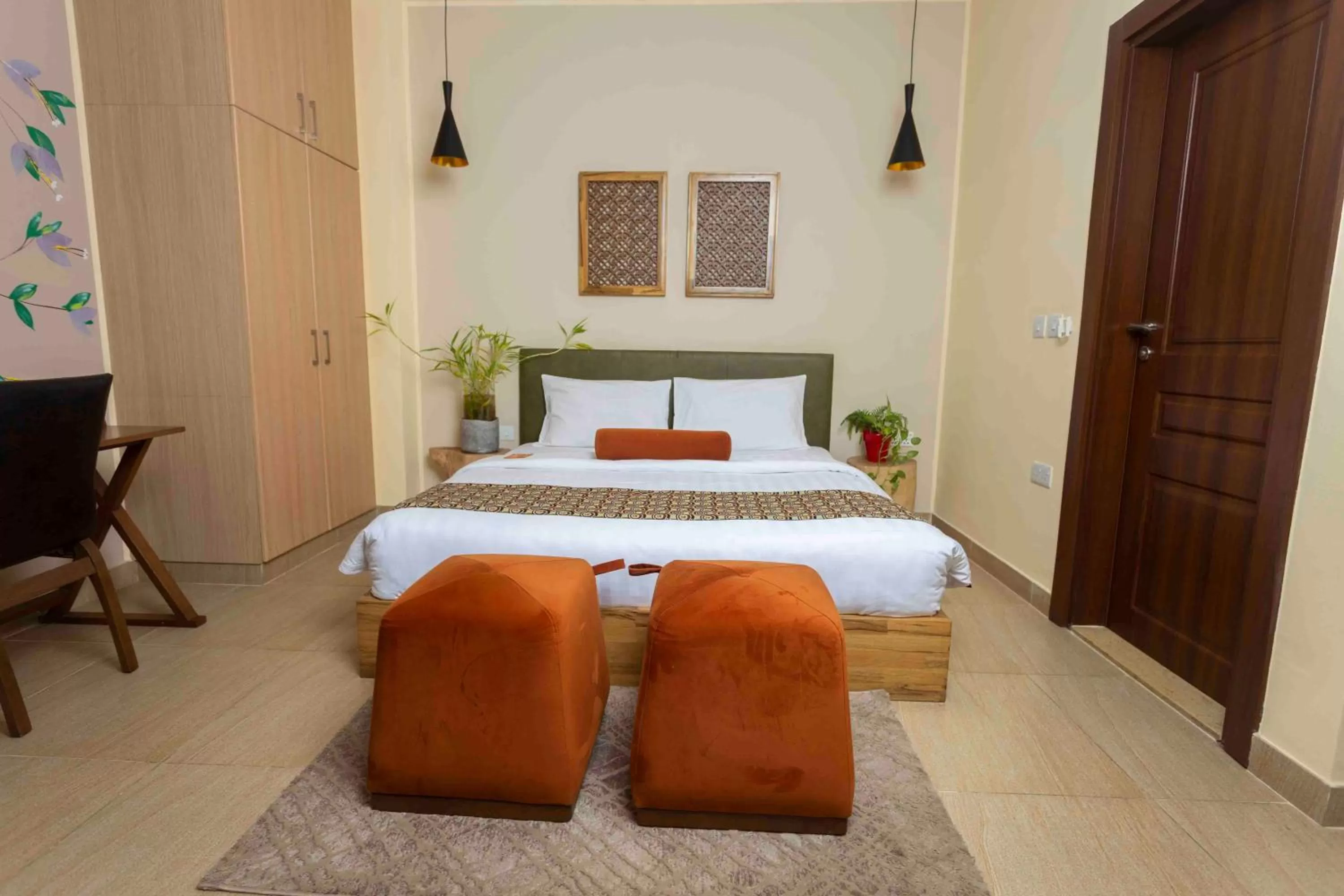 Bed in Roots Hotel Apartment