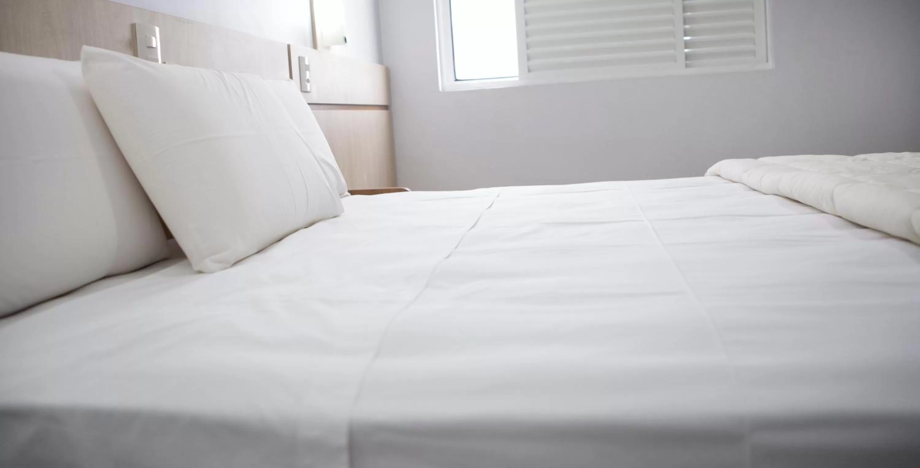 Bed in Hotel Baviera Iguassu