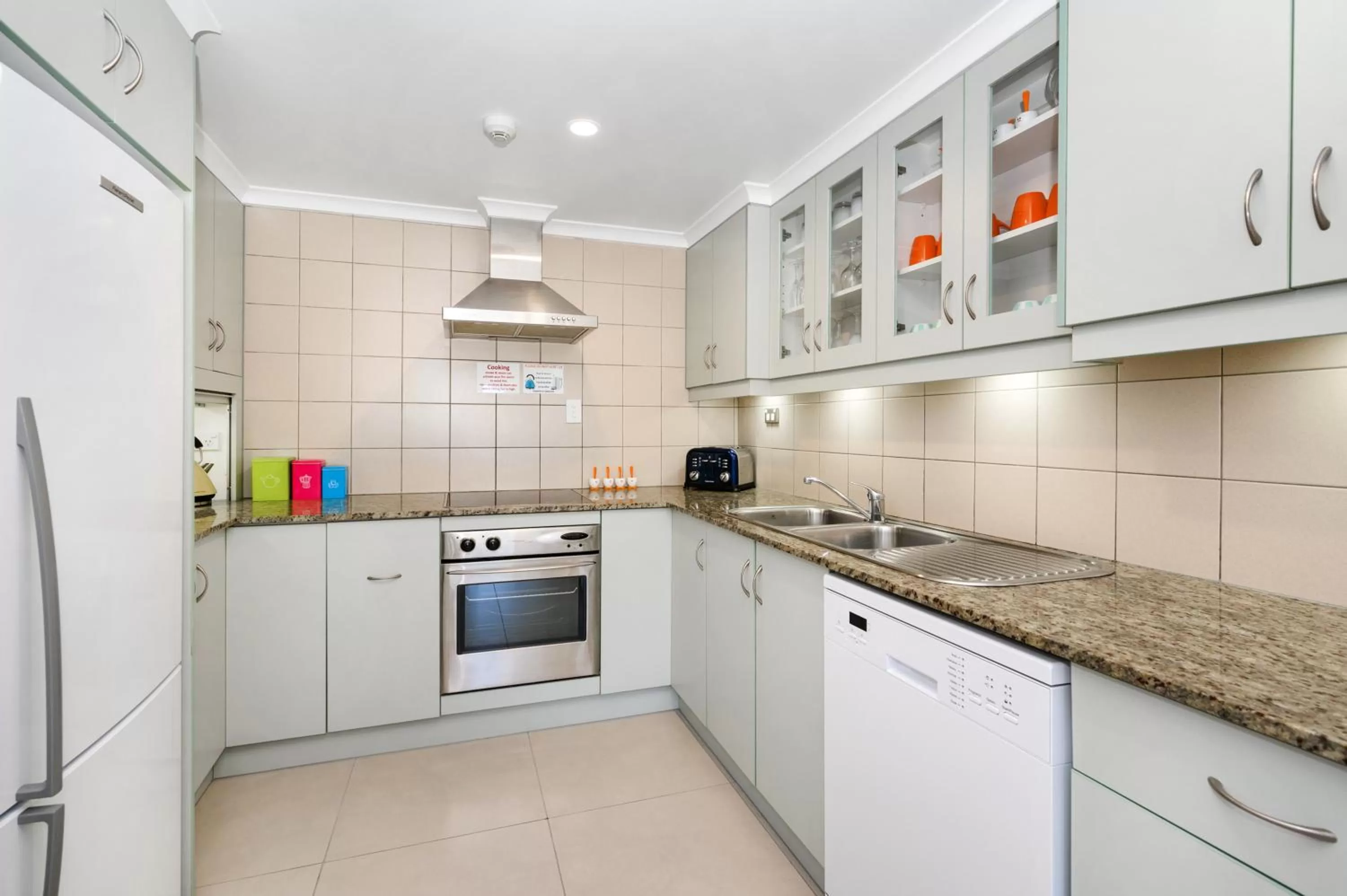 Kitchen or kitchenette in By The Sea Port Douglas