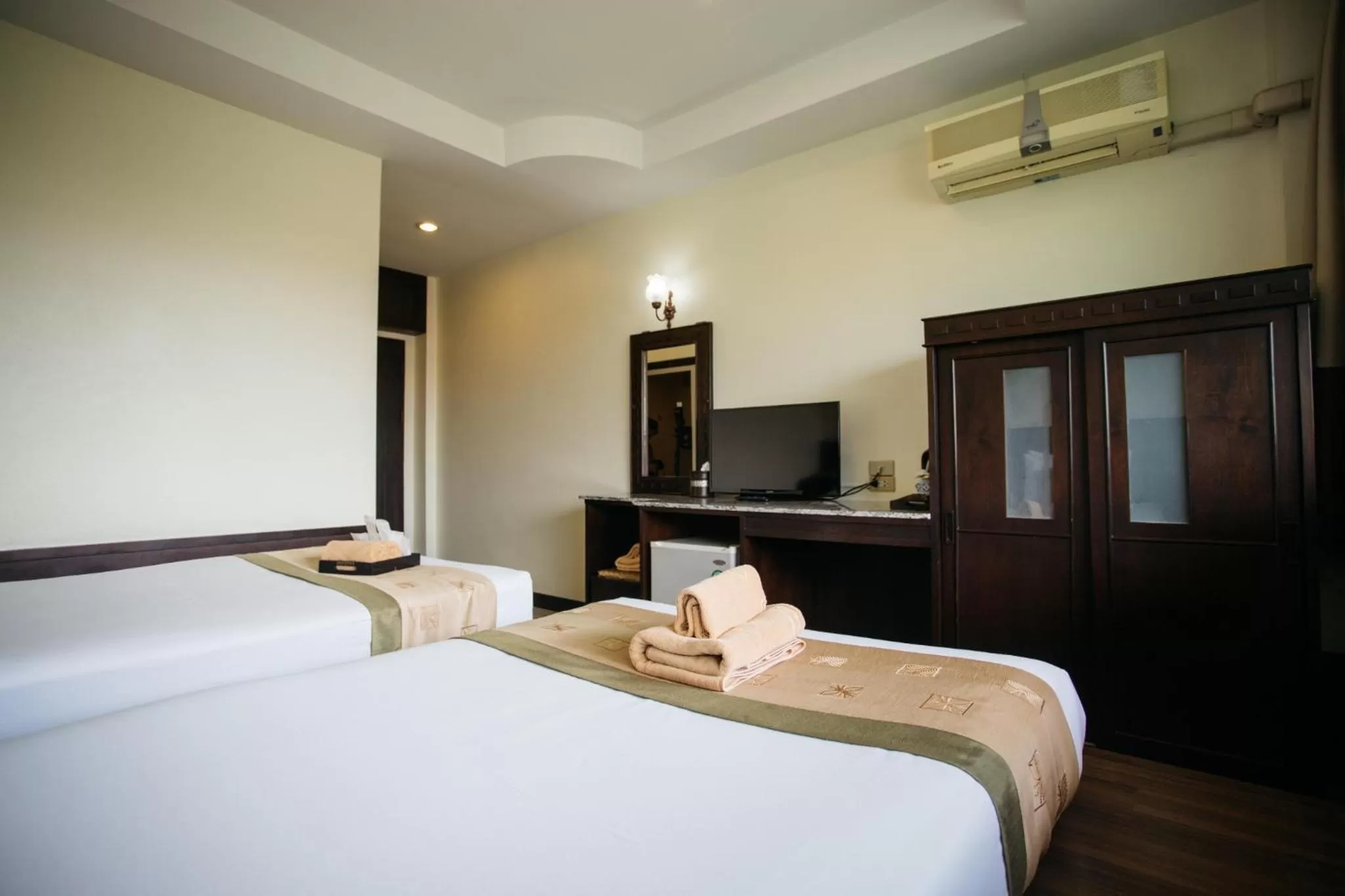 Bed in Diamond Park Inn Chiangrai & Resort