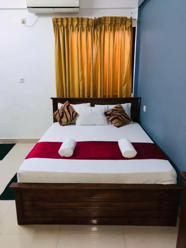 Bed in Yal's Town Inn