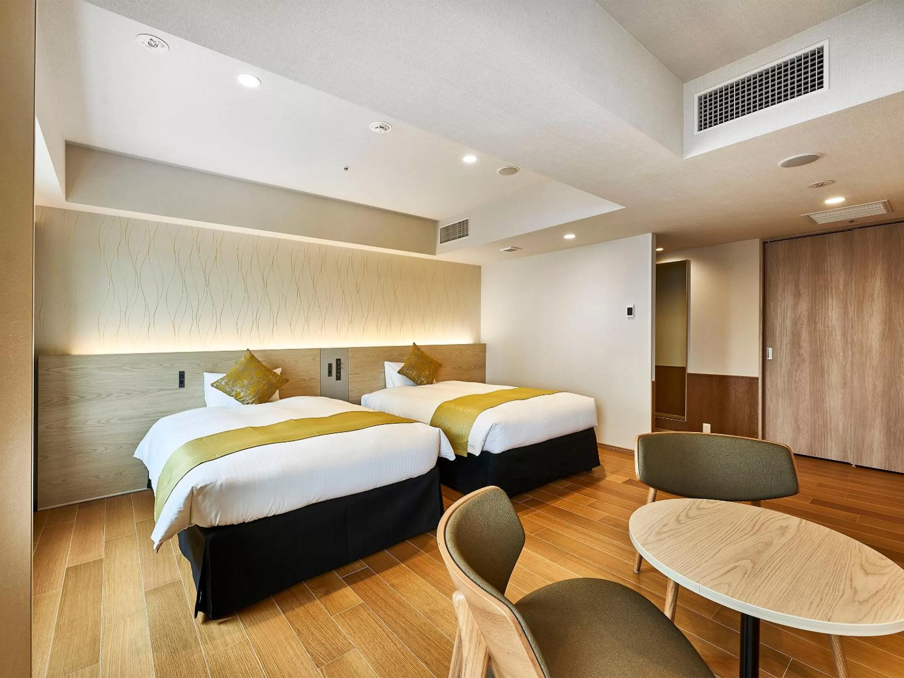 Bed in DEL style Osaka-Shinsaibashi by Daiwa Roynet Hotel