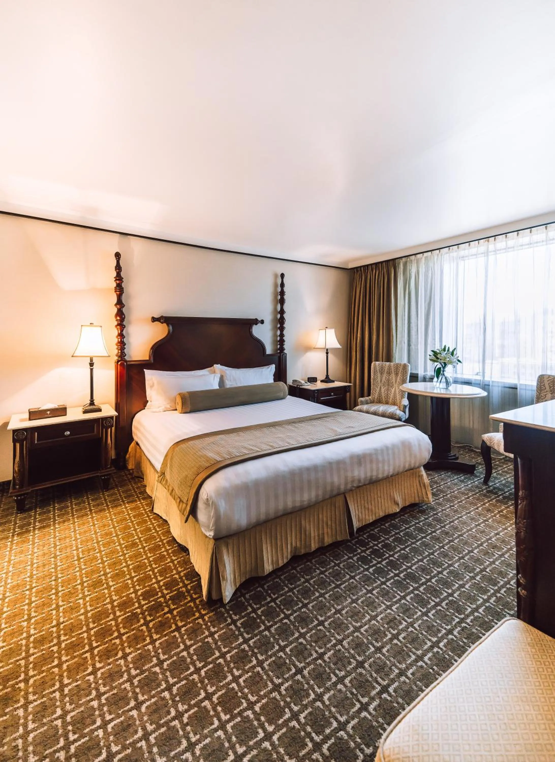 Bed in Chinggis Khaan Hotel