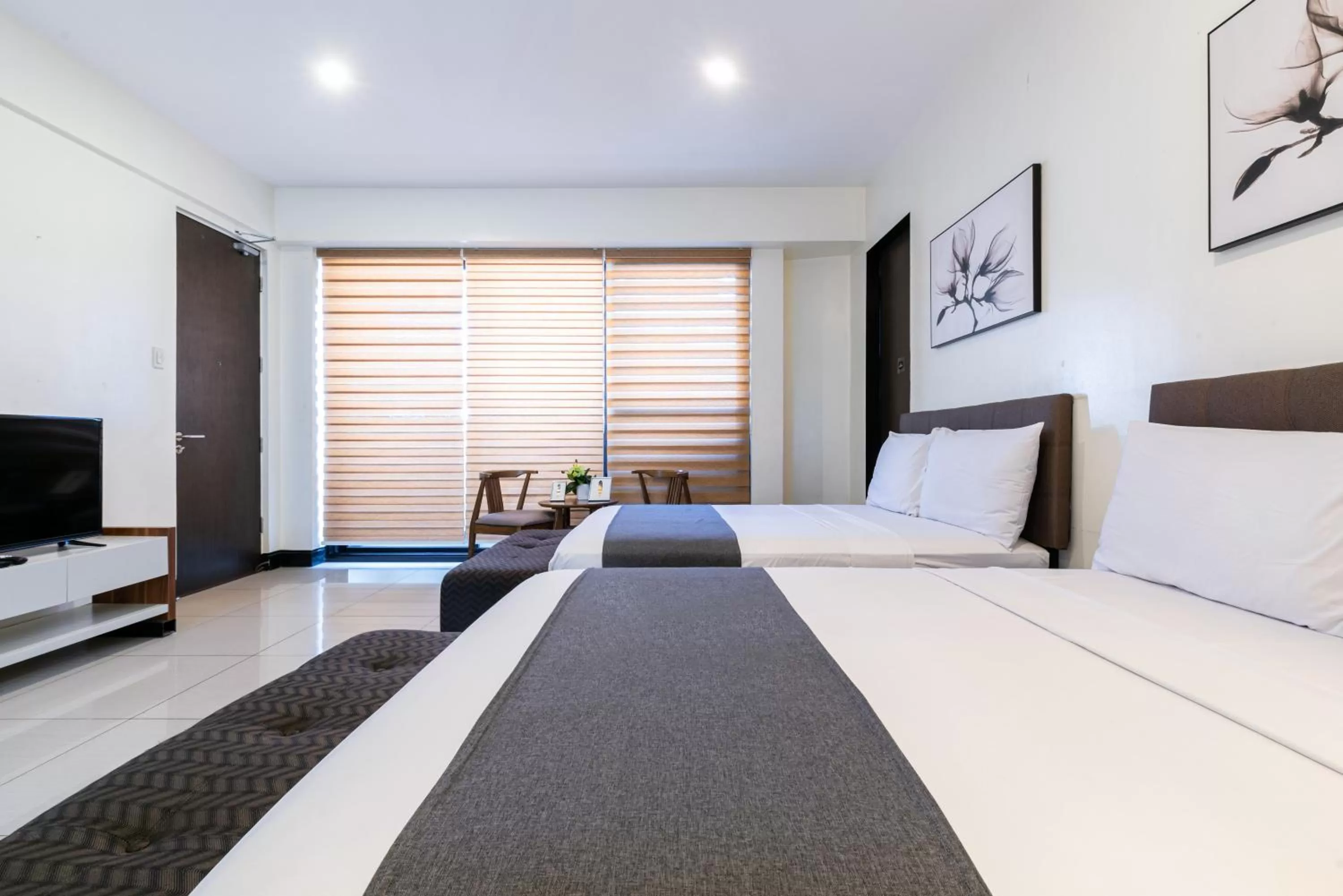 Bedroom, Bed in Artemis Place Makati Hotel