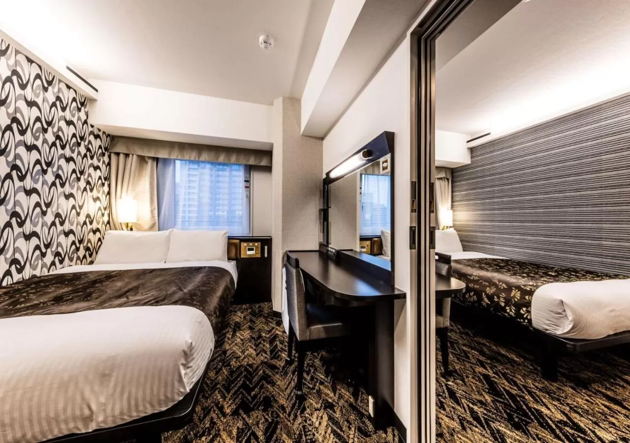 Photo of the whole room, Bed in APA Hotel & Resort Osaka Umeda Eki Tower