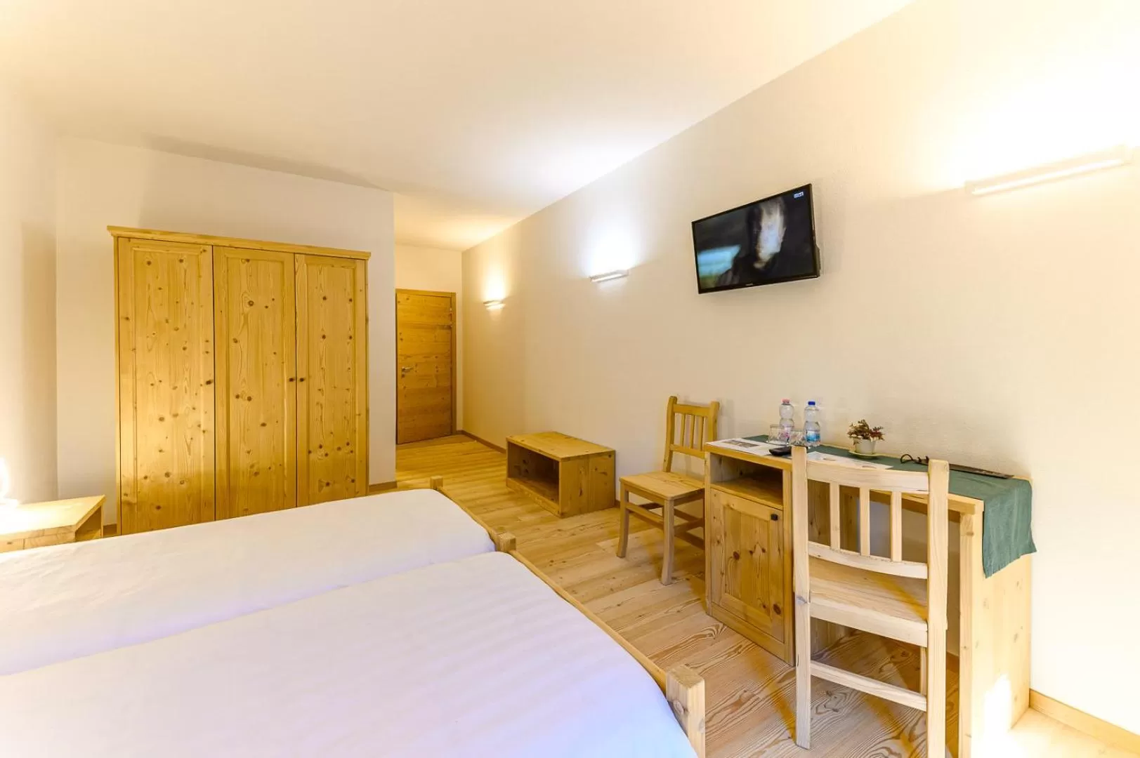 Bedroom, Bed in Hotel Centrale, Typically Swiss