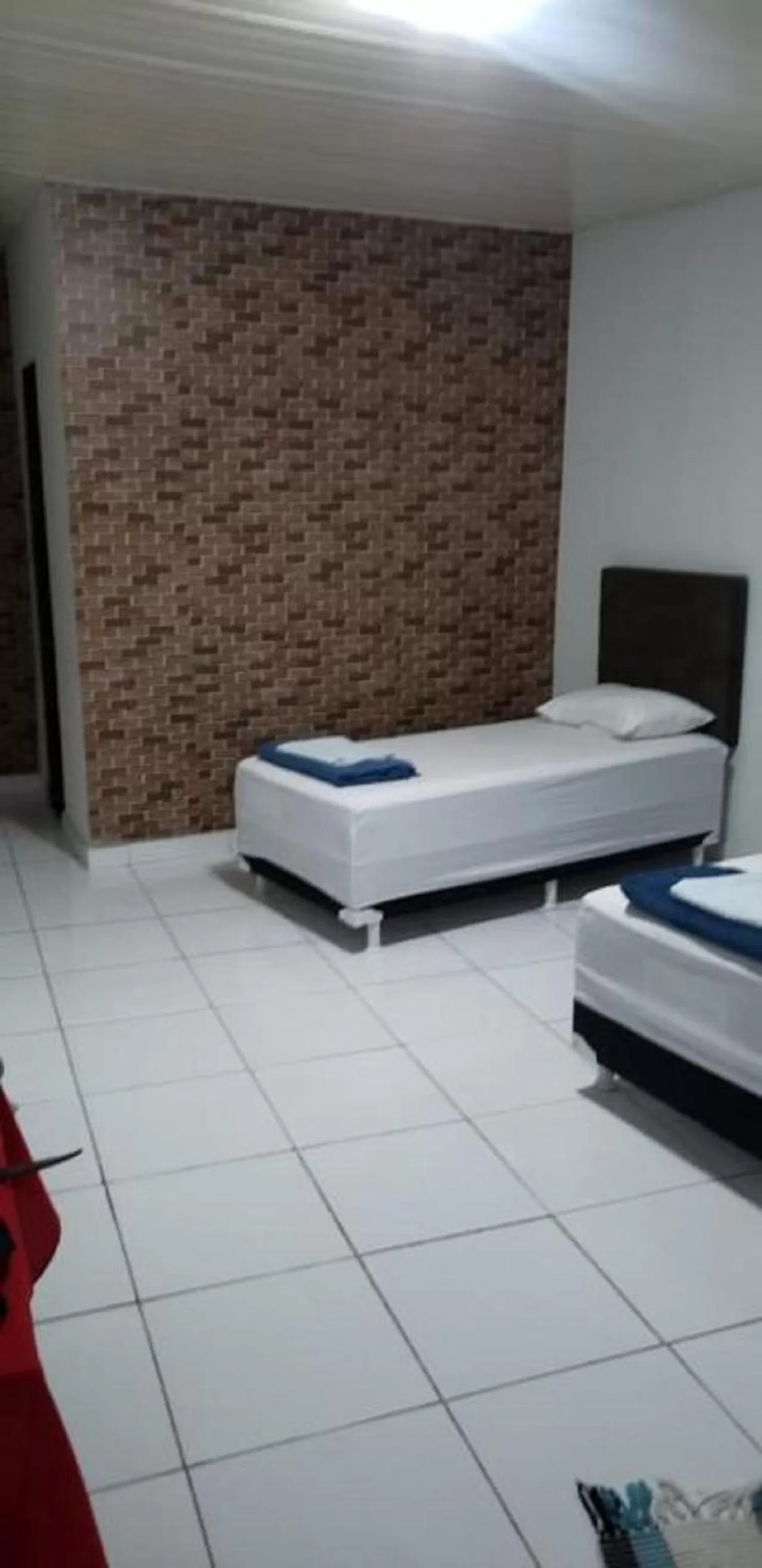 Bed in Pousada e Posto Amigão