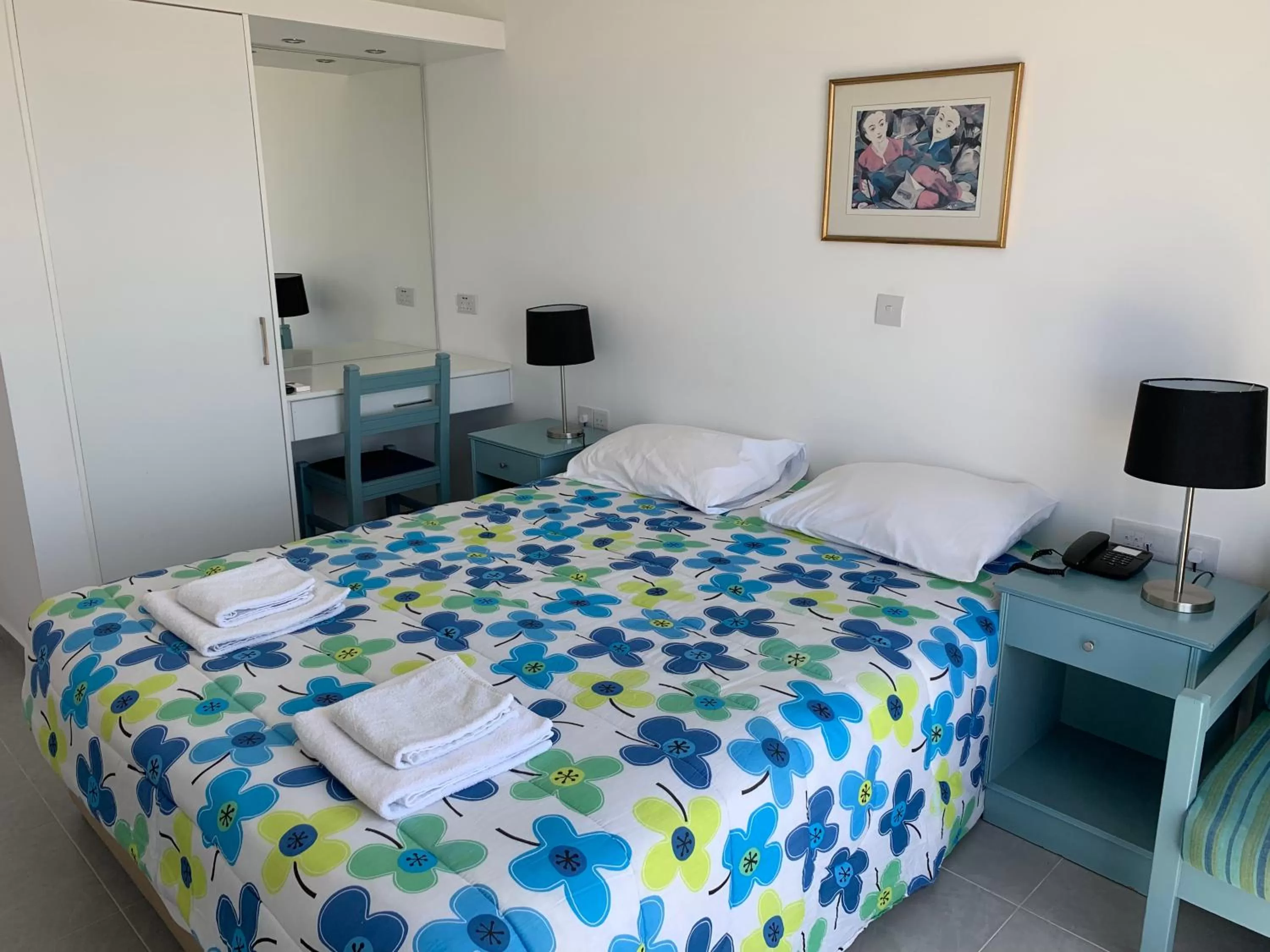 Bed in Axiothea Hotel